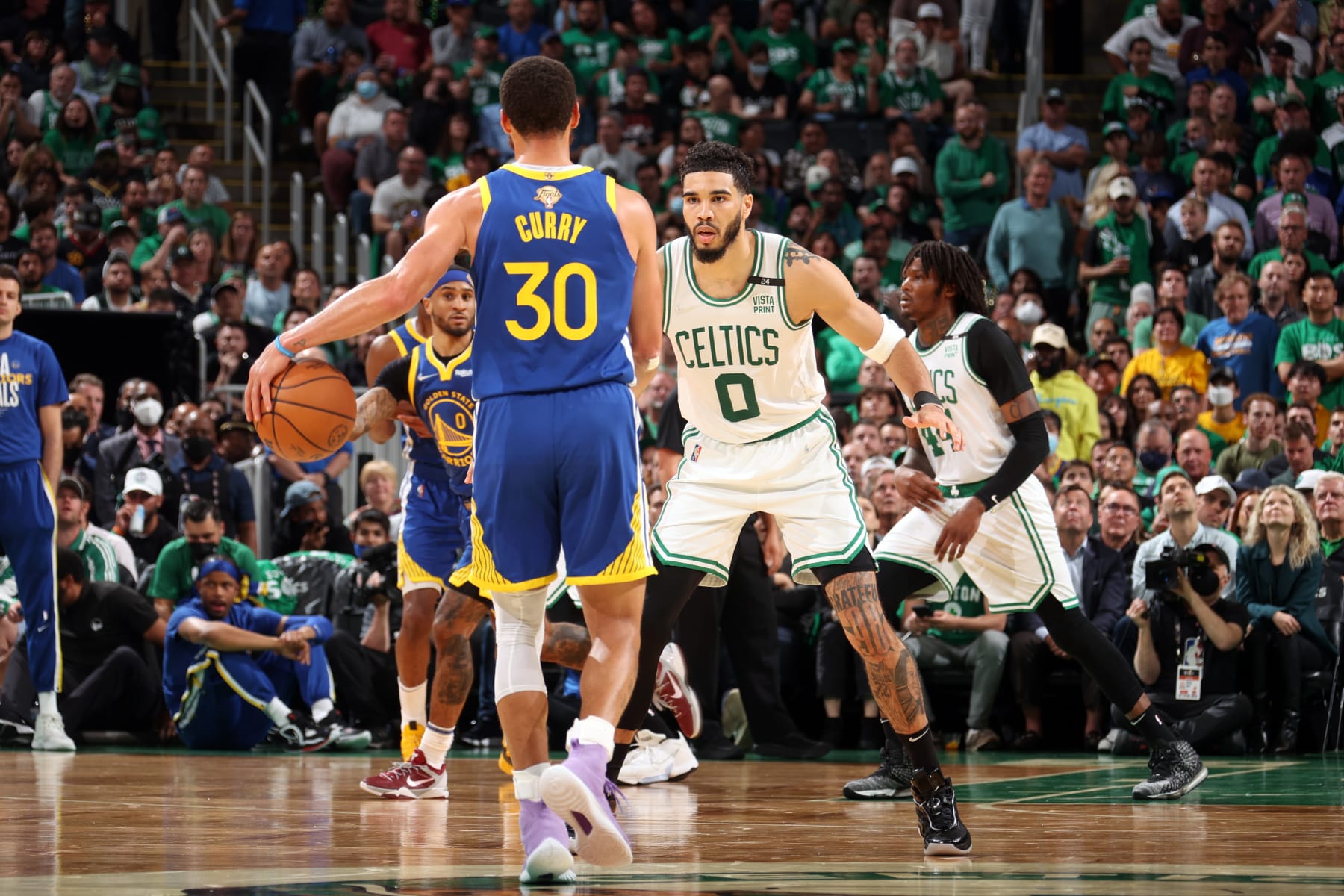 BOSTON, MA - JUNE 16: Jayson Tatum #0 of the Boston Celtics plays defense on Stephen Curry #30 of the Golden State Warriors during Game Six of the 2022 NBA Finals on June 16, 2022 at TD Garden in Boston, Massachusetts. NOTE TO USER: User expressly acknowledges and agrees that, by downloading and or using this photograph, user is consenting to the terms and conditions of Getty Images License Agreement. Mandatory Copyright Notice: Copyright 2022 NBAE (Photo by Nathaniel S. Butler/NBAE via Getty Images)