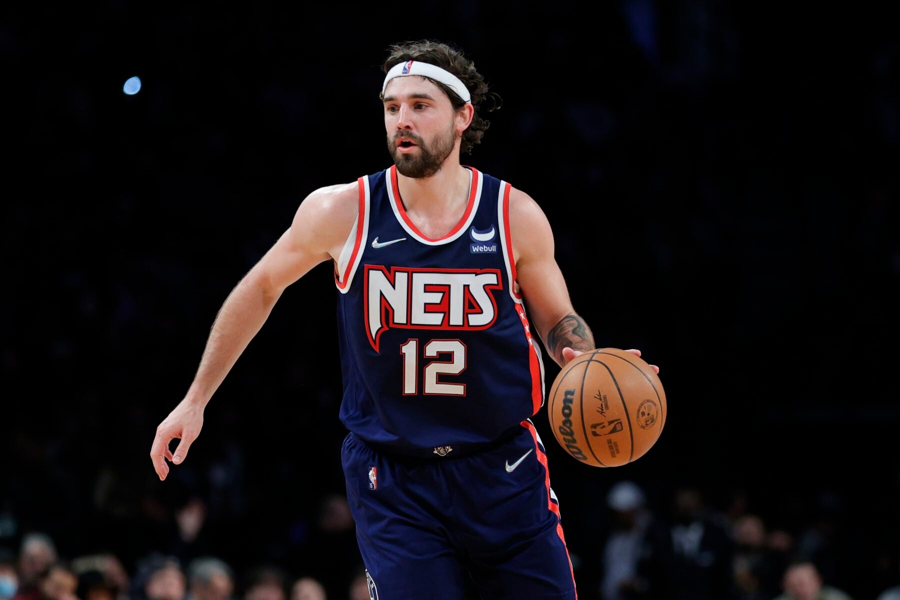 NEW YORK, NEW YORK - NOVEMBER 03: Joe Harris #12 of the Brooklyn Nets dribbles during the second half against the Atlanta Hawks at Barclays Center on November 03, 2021 in the Brooklyn borough of New York City. NOTE TO USER: User expressly acknowledges and agrees that, by downloading and or using this photograph, user is consenting to the terms and conditions of the Getty Images License Agreement. (Photo by Sarah Stier/Getty Images)