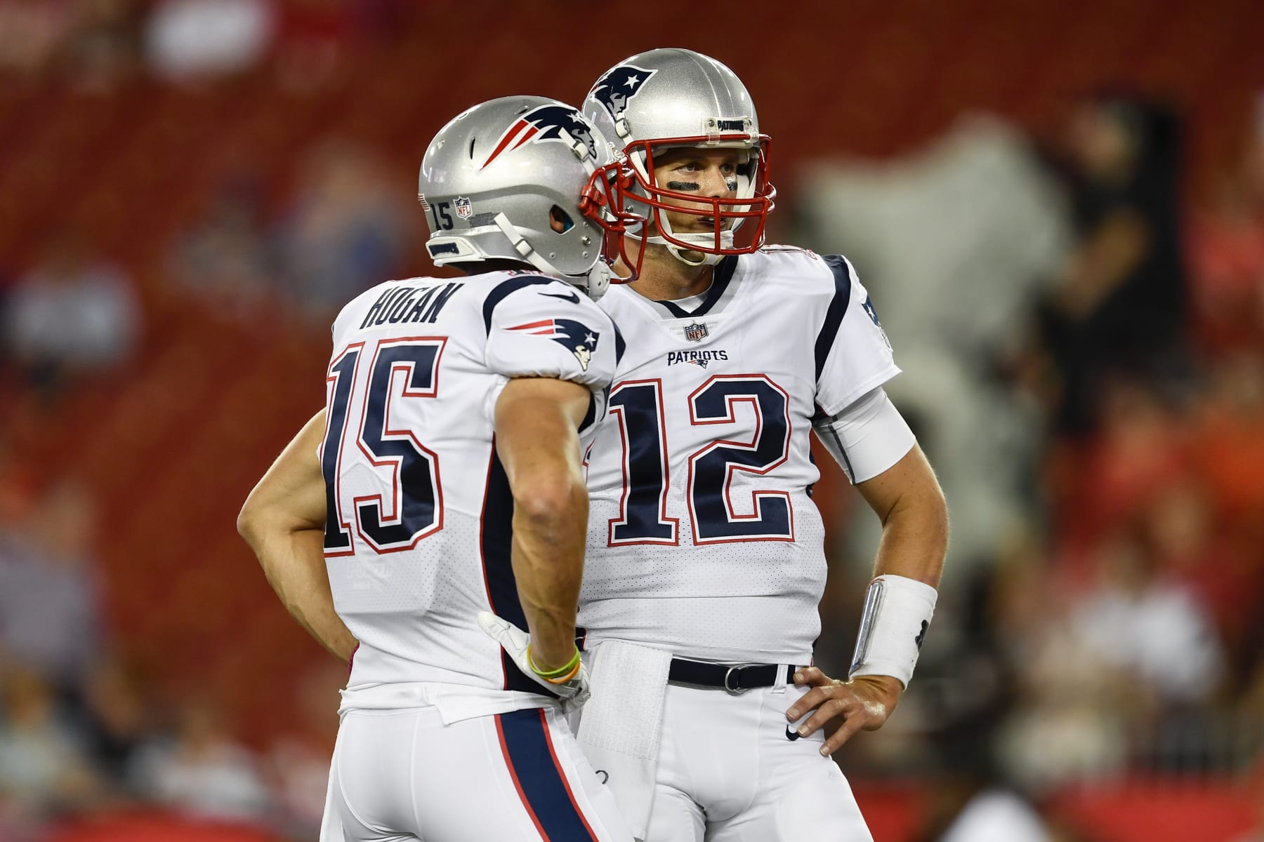 TAMPA, FL - OCTOBER 05: New England Patriots quarterback Tom Brady (12) talks with New England Patriots wide receiver Chris Hogan (15) prior to an NFL football game between the New England Patriots and the Tampa Bay Buccaneers on October 05, 2017, at Raymond James Stadium in Tampa, FL. (Photo by Roy K. Miller/Icon Sportswire via Getty Images)