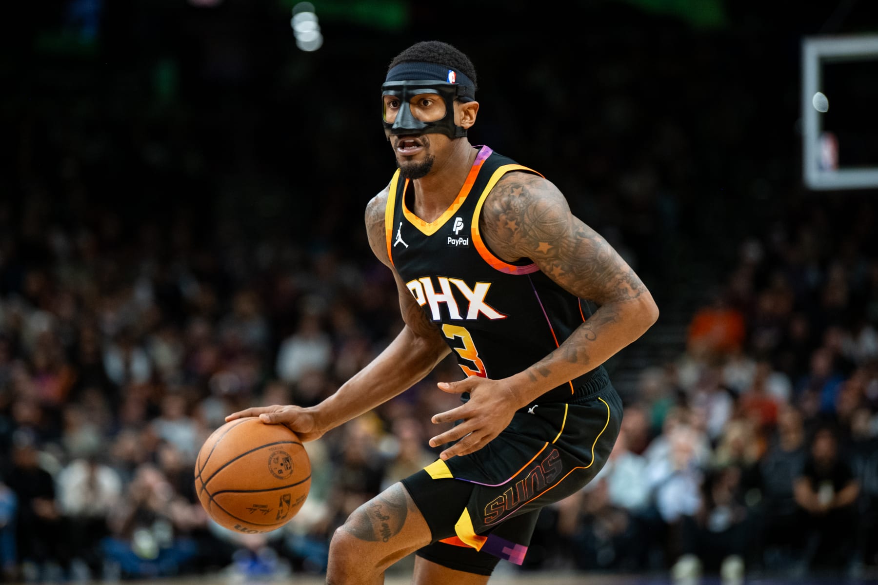 PHOENIX, ARIZONA - FEBRUARY 06: Bradley Beal #3 of the Phoenix Suns controls the ball against the Milwaukee Bucks during the first half of the NBA game at Footprint Center on February 06, 2024 in Phoenix, Arizona. The Suns defeated the Bucks 114-106. NOTE TO USER: User expressly acknowledges and agrees that, by downloading and or using this photograph, User is consenting to the terms and conditions of the Getty Images License Agreement.  (Photo by Kelsey Grant/Getty Images)