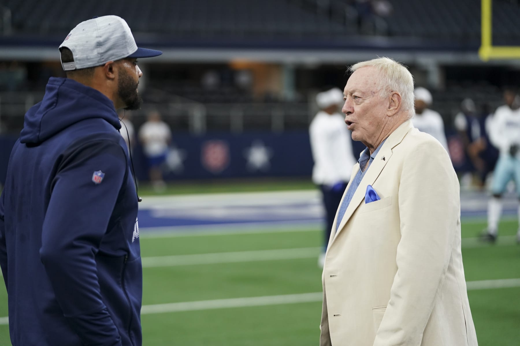 ARLINGTON, TEXAS - AUGUST 29: Dallas Cowboys owner owner Jerry Jones speaks with quarterback Dak Prescott #4 prior to an NFL game against the Jacksonville Jaguars at AT&T Stadium on August 29, 2021 in Arlington, Texas. (Photo by Cooper Neill/Getty Images)