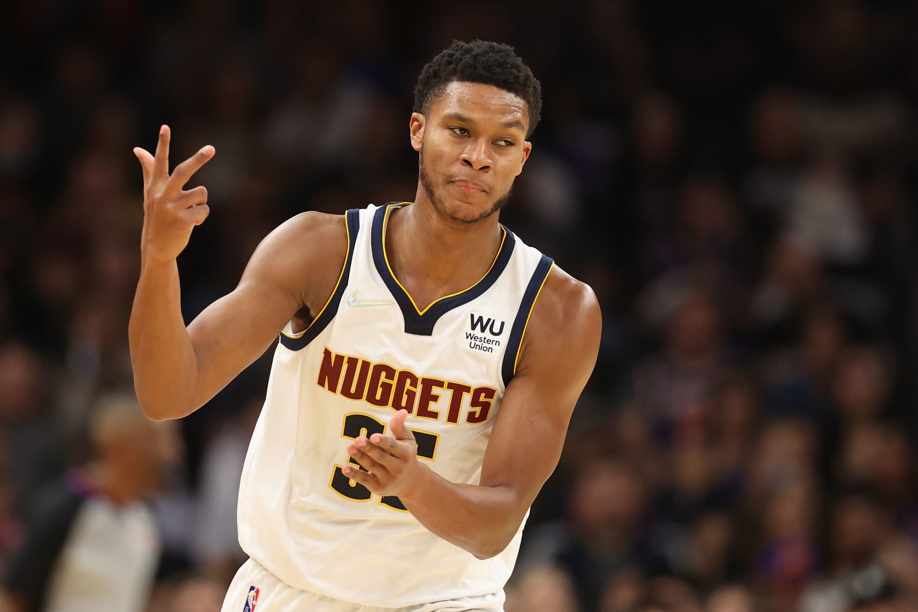 PHOENIX, ARIZONA - OCTOBER 20: P.J. Dozier #35 of the Denver Nuggets reacts after a three-point shot against the Phoenix Suns during the second half of the NBA game at Footprint Center on October 20, 2021 in Phoenix, Arizona. The Nuggets defeated the Suns 110-98. NOTE TO USER: User expressly acknowledges and agrees that, by downloading and or using this photograph, User is consenting to the terms and conditions of the Getty Images License Agreement. (Photo by Christian Petersen/Getty Images)