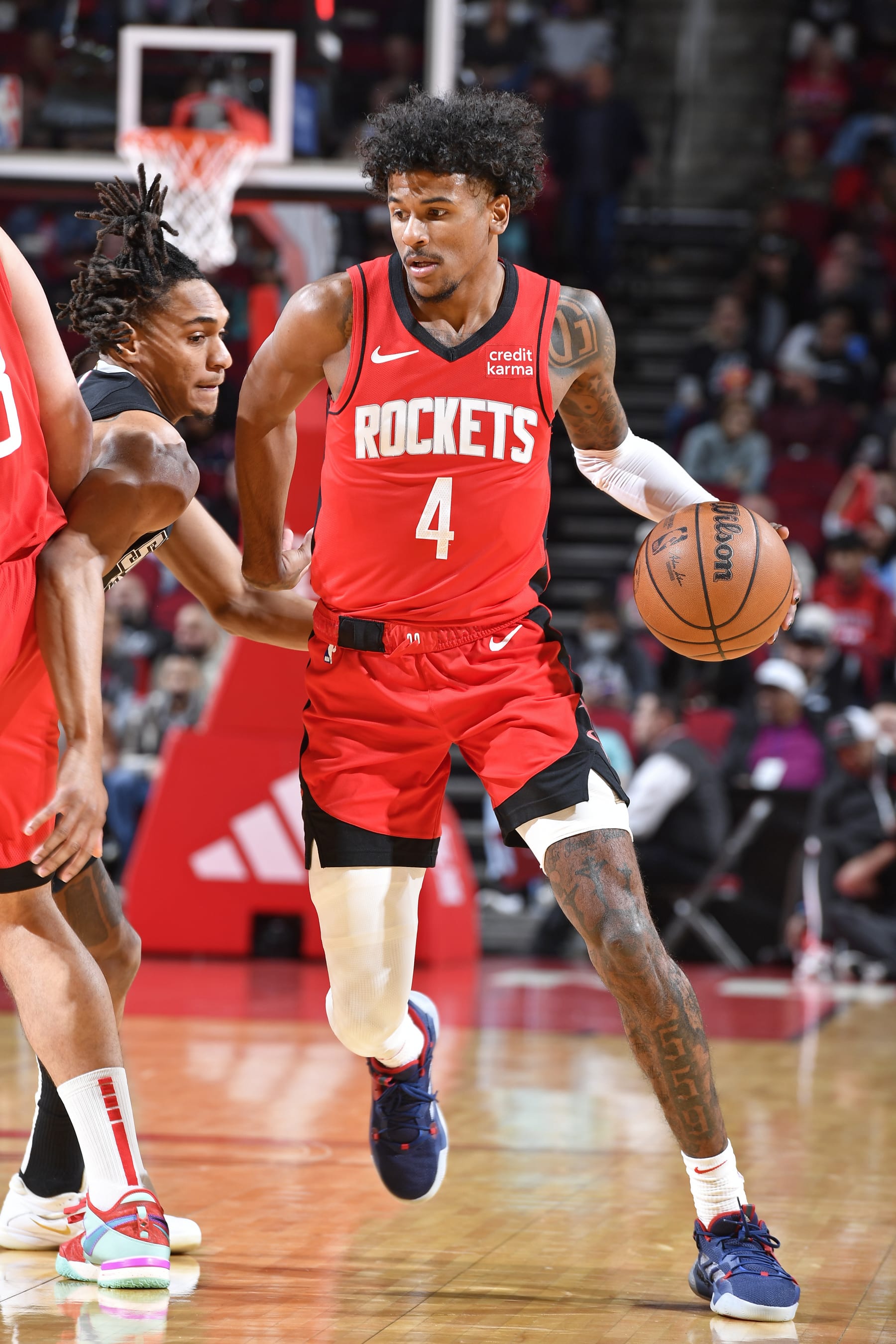 HOUSTON, TX - DECEMBER 11: Jalen Green #4 of the Houston Rockets handles the ball during the game against the San Antonio Spurs on December 11, 2023 at the Toyota Center in Houston, Texas. NOTE TO USER: User expressly acknowledges and agrees that, by downloading and or using this photograph, User is consenting to the terms and conditions of the Getty Images License Agreement. Mandatory Copyright Notice: Copyright 2023 NBAE (Photo by Logan Riely/NBAE via Getty Images)