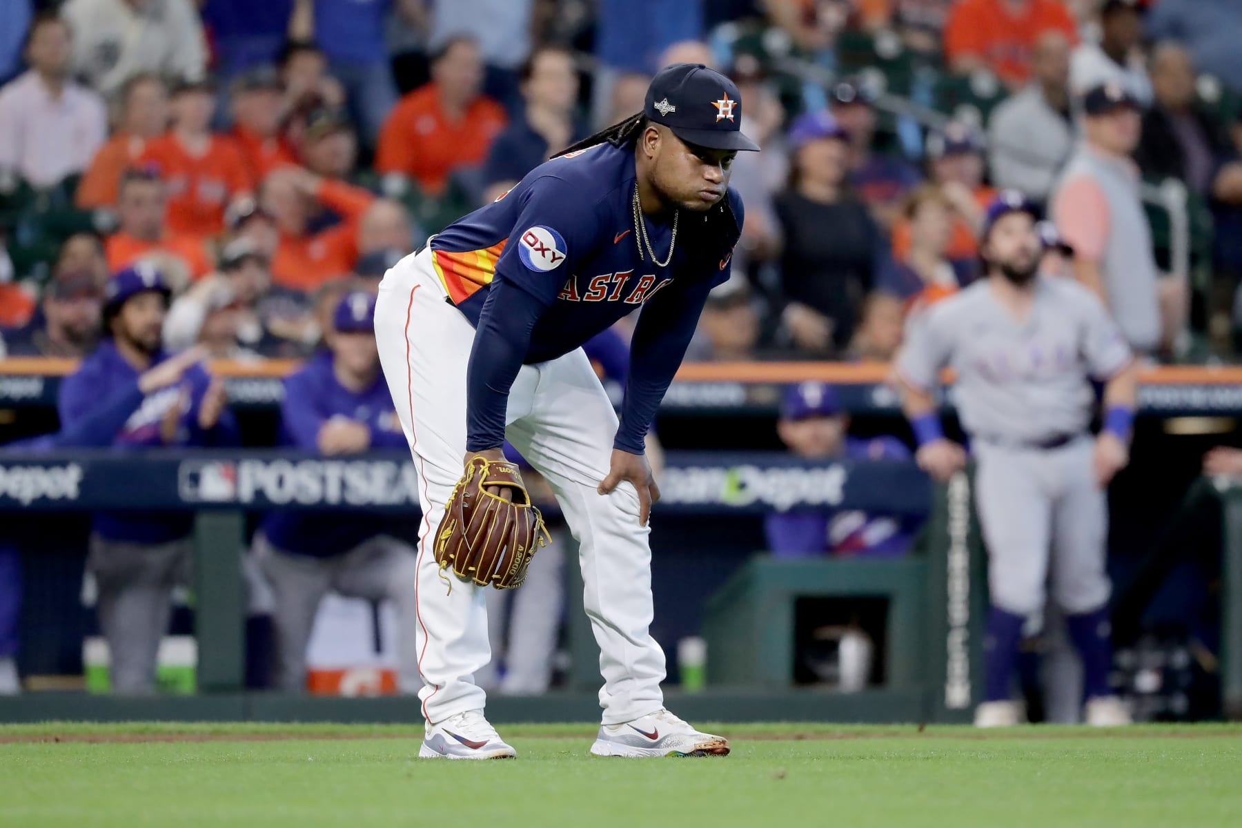 HOUSTON, TEXAS - OCTOBER 16: Framber Valdez #59 of the Houston Astros reacts after a throwing error against the Texas Rangers during the first inning in Game Two of the American League Championship Series at Minute Maid Park on October 16, 2023 in Houston, Texas. (Photo by Bob Levey/Getty Images)