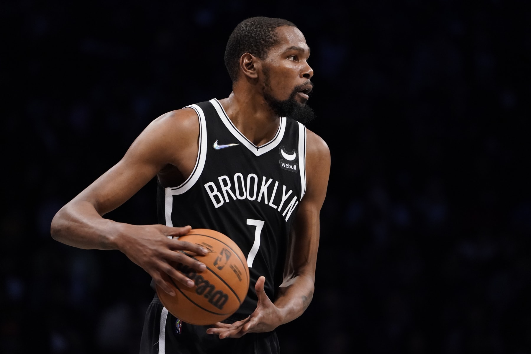 Brooklyn Nets forward Kevin Durant looks to pass during the second half of an NBA basketball game against the Miami Heat, Wednesday, Oct. 27, 2021, in New York. (AP Photo/John Minchillo)