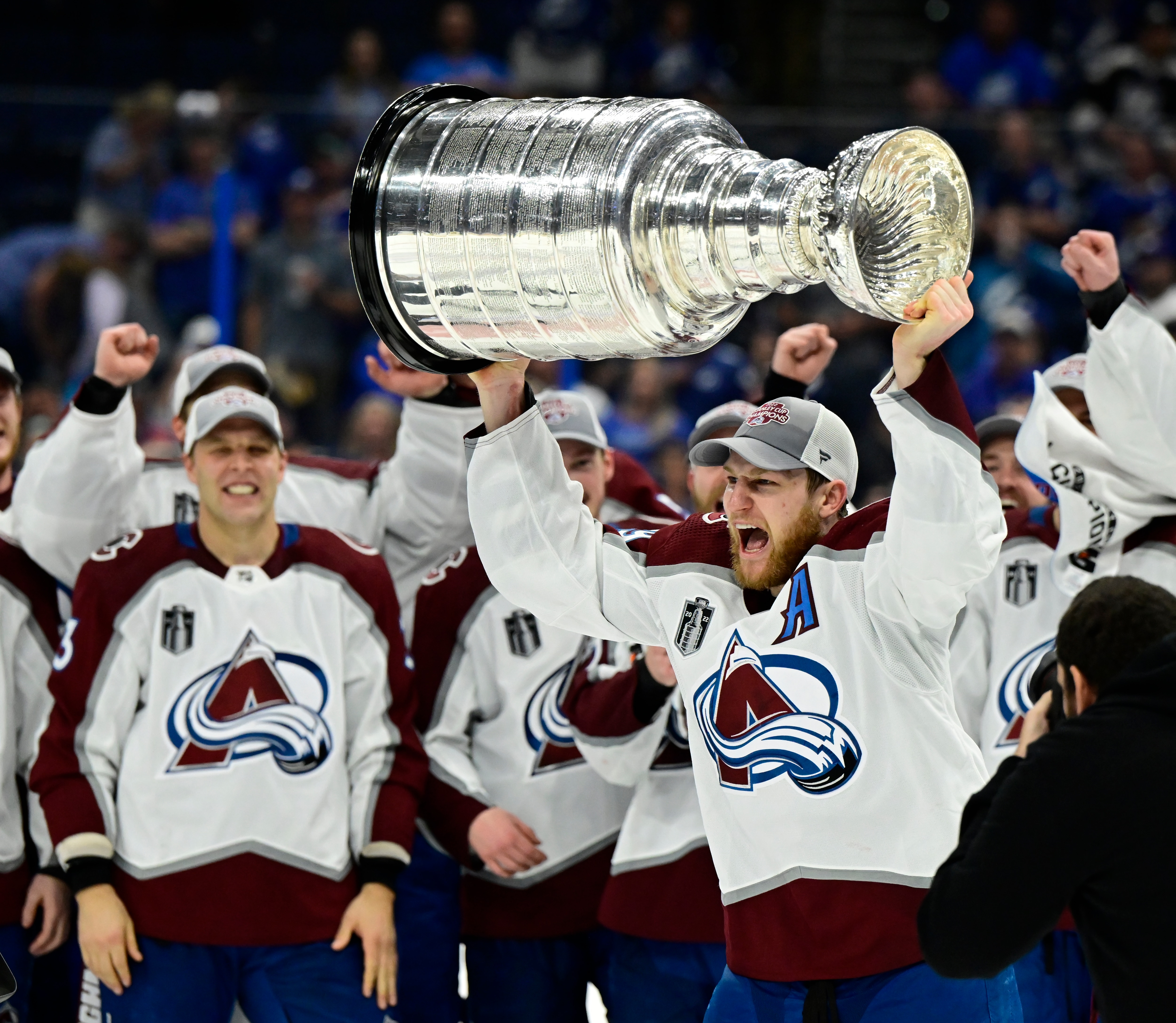 TAMPA BAY, FL - JUNE 26: Colorado Avalanche center Nathan MacKinnon (29) celebrates as he hoists the Stanley Cup after defeating the Tampa Bay Lighting 2-1 in game six of the NHL Stanley Cup Finals at Amalie Arena June 26, 2022. (Photo by Andy Cross/MediaNews Group/The Denver Post via Getty Images)