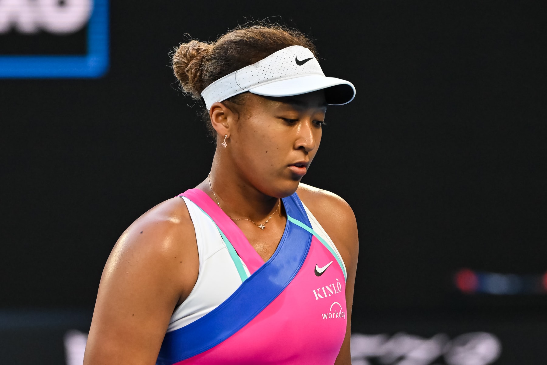 MELBOURNE, AUSTRALIA - JANUARY 19: Naomi Osaka of Japan hits a forehand looks frustrated during her nmatch against Madison Brengle of the United States during day three of the 2022 Australian Open at Melbourne Park on January 19, 2022 in Melbourne, Australia. (Photo by TPN/Getty Images)
