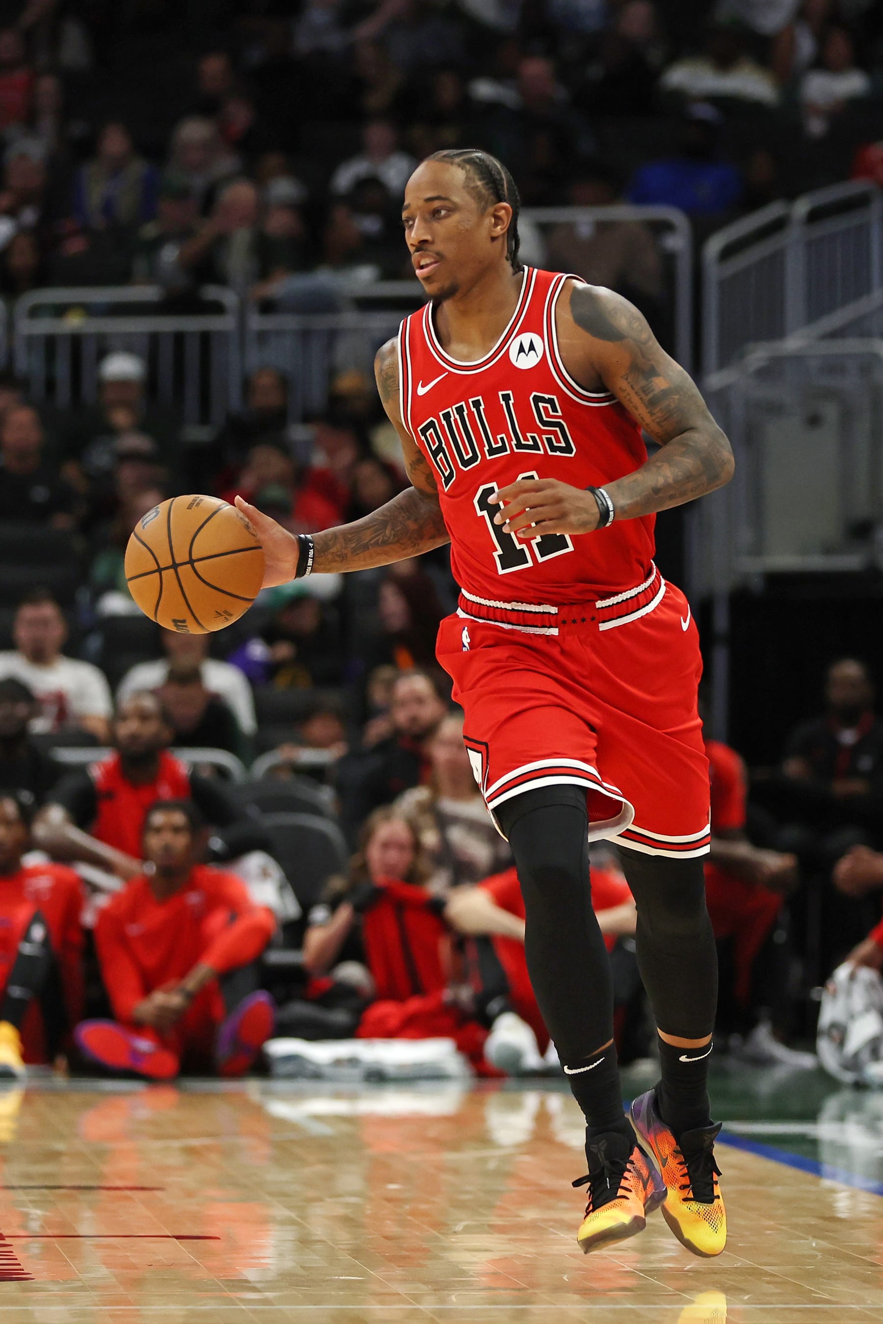 MILWAUKEE, WISCONSIN - OCTOBER 08: DeMar DeRozan #11 of the Chicago Bulls handles the ball during a game against the Milwaukee Bucks during a preseason game at Fiserv Forum on October 08, 2023 in Milwaukee, Wisconsin. NOTE TO USER: User expressly acknowledges and agrees that, by downloading and or using this photograph, User is consenting to the terms and conditions of the Getty Images License Agreement. (Photo by Stacy Revere/Getty Images)