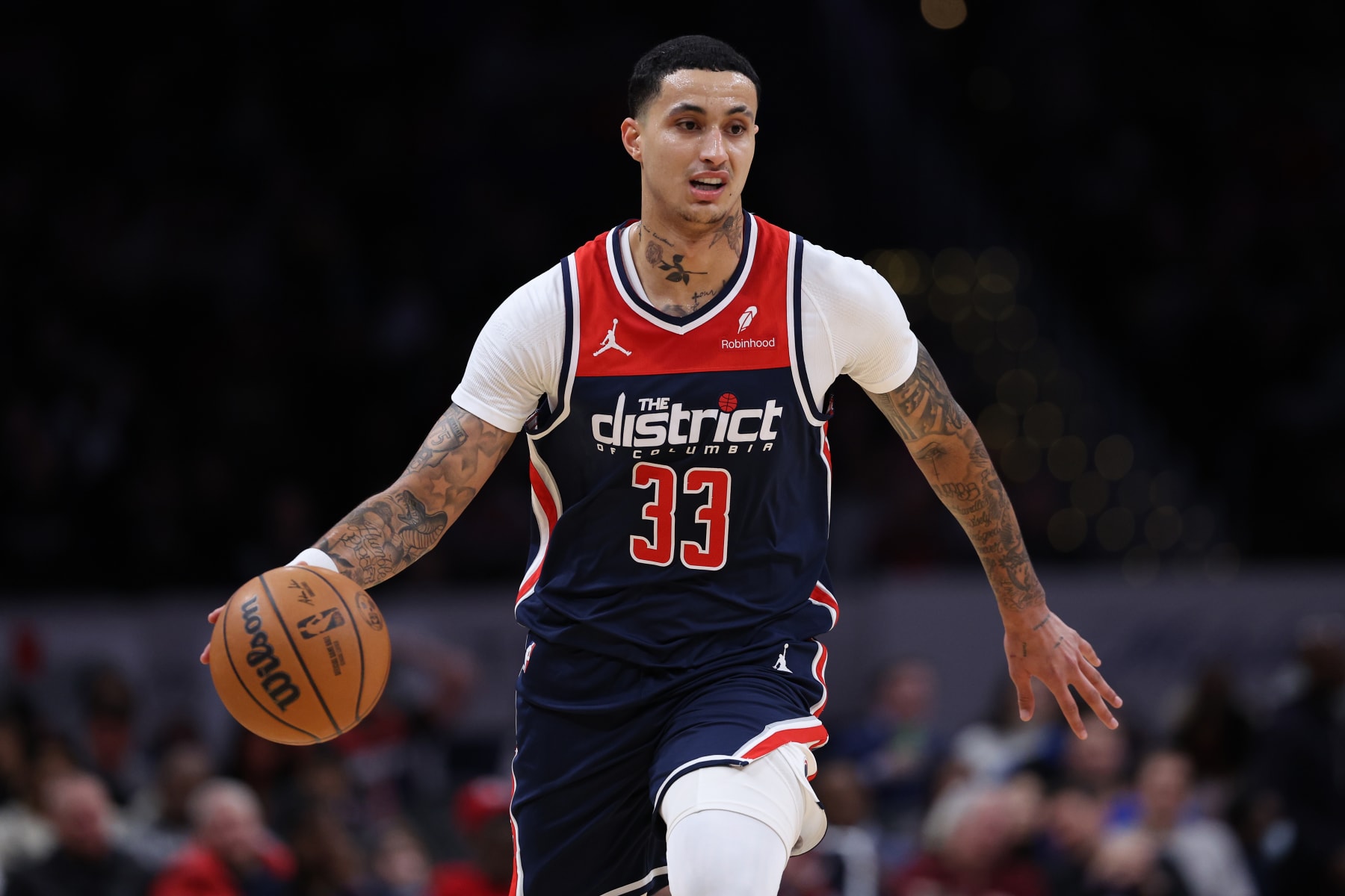 WASHINGTON, DC - JANUARY 15: Kyle Kuzma #33 of the Washington Wizards dribbles the ball up court against the Detroit Pistons at Capital One Arena on January 15, 2024 in Washington, DC. NOTE TO USER: User expressly acknowledges and agrees that, by downloading and or using this photograph, User is consenting to the terms and conditions of the Getty Images License Agreement  (Photo by Patrick Smith/Getty Images)