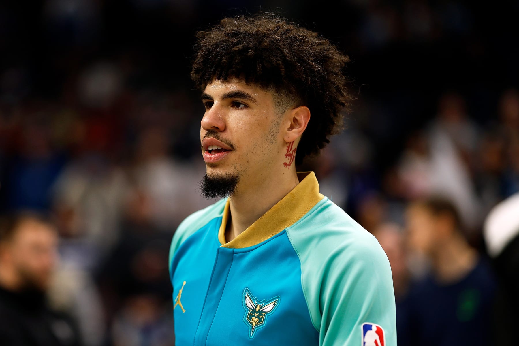 MINNEAPOLIS, MINNESOTA - JANUARY 22: LaMelo Ball #1 of the Charlotte Hornets looks on prior to the start of the game against the Minnesota Timberwolves at Target Center on January 22, 2024 in Minneapolis, Minnesota. The Hornets defeated the Timberwolves 128-125. NOTE TO USER: User expressly acknowledges and agrees that, by downloading and or using this photograph, User is consenting to the terms and conditions of the Getty Images License Agreement. (Photo by David Berding/Getty Images)