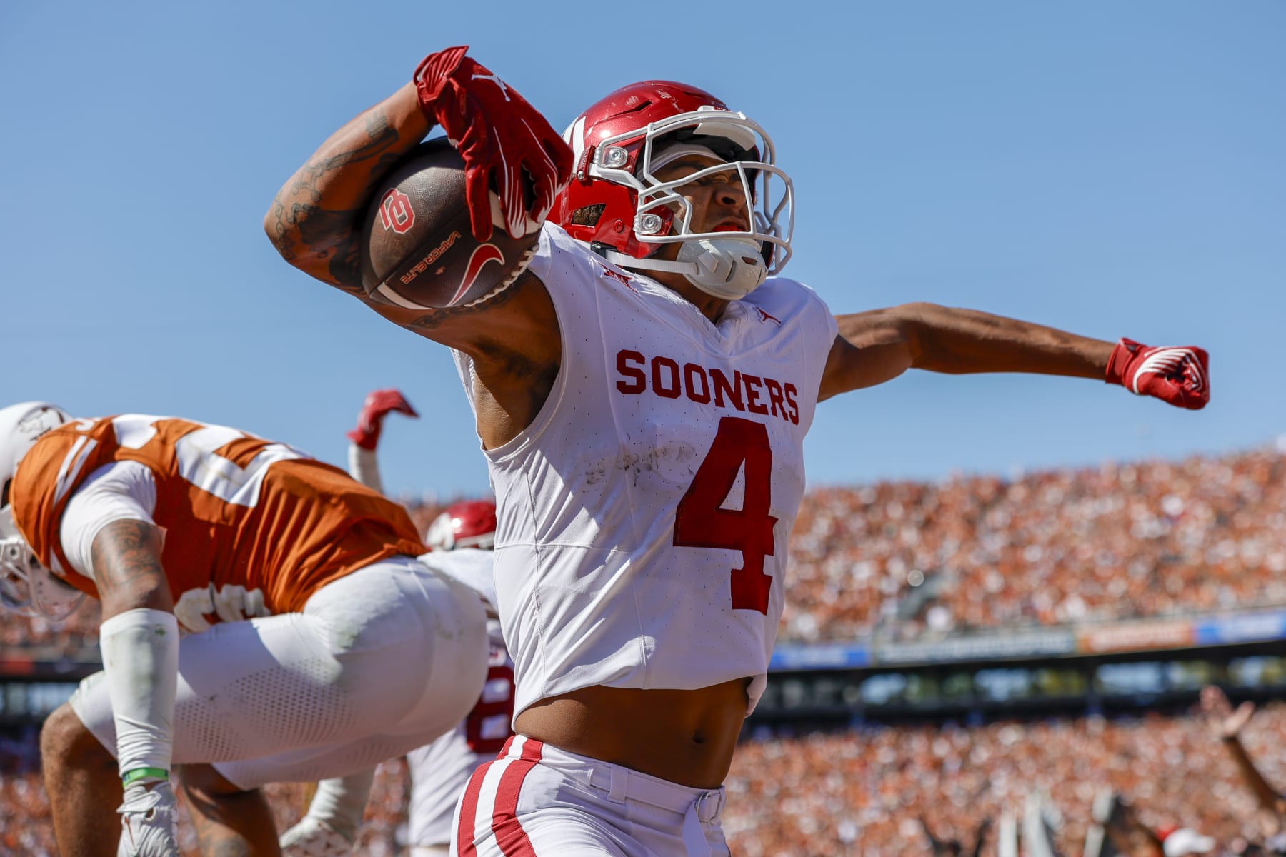 DALLAS, TX - OCTOBER 07: Oklahoma Sooners wide receiver Nic Anderson (4) celebrates after catching the game winning touchdown during the game between the Texas Longhorns and the Oklahoma Sooners on October 7, 2023 at the Cotton Bowl in Dallas, Texas. (Photo by Matthew Pearce/Icon Sportswire via Getty Images)