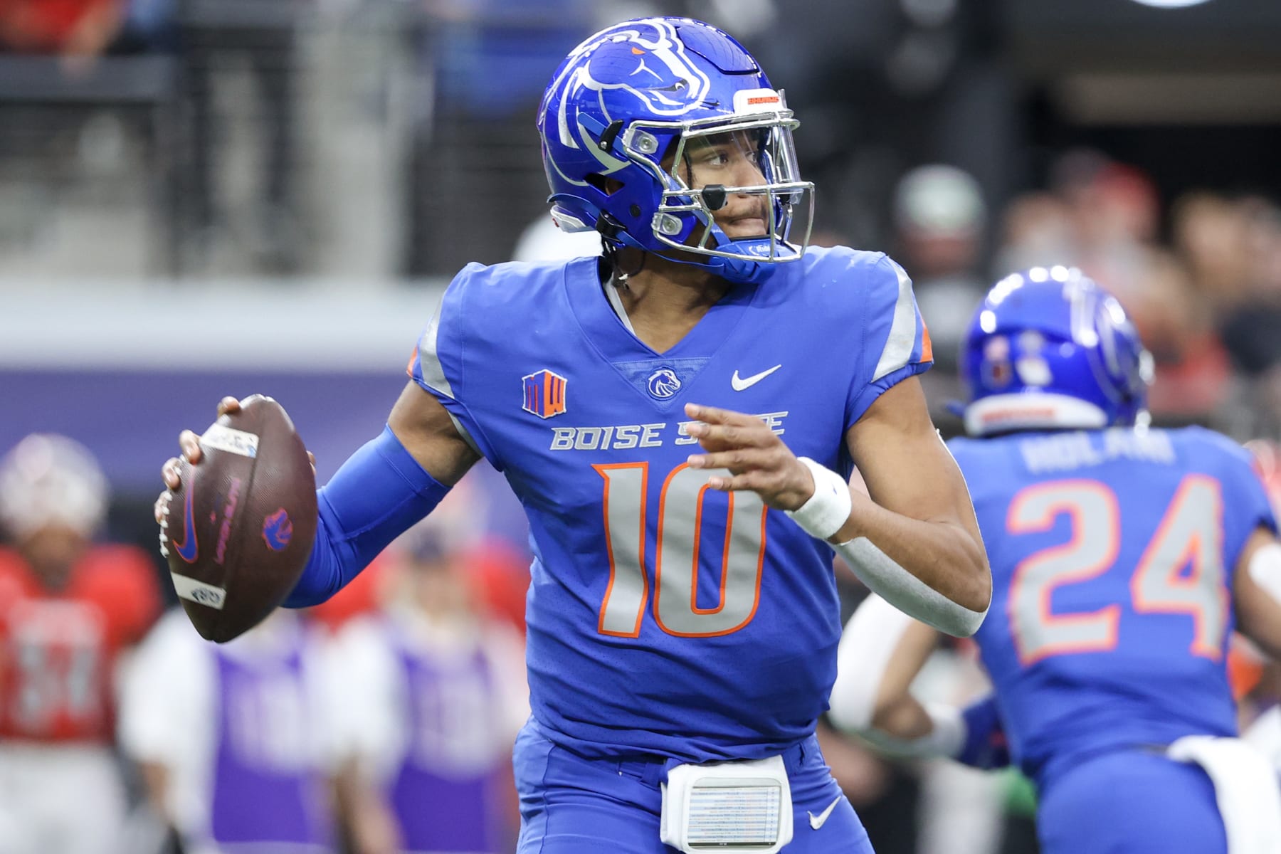 LAS VEGAS, NEVADA - DECEMBER 02: Taylen Green #10 of the Boise State Broncos attempts a pass during the first quarter against the UNLV Rebels during the Mountain West Football Championship at Allegiant Stadium on December 02, 2023 in Las Vegas, Nevada. (Photo by Ian Maule/Getty Images)