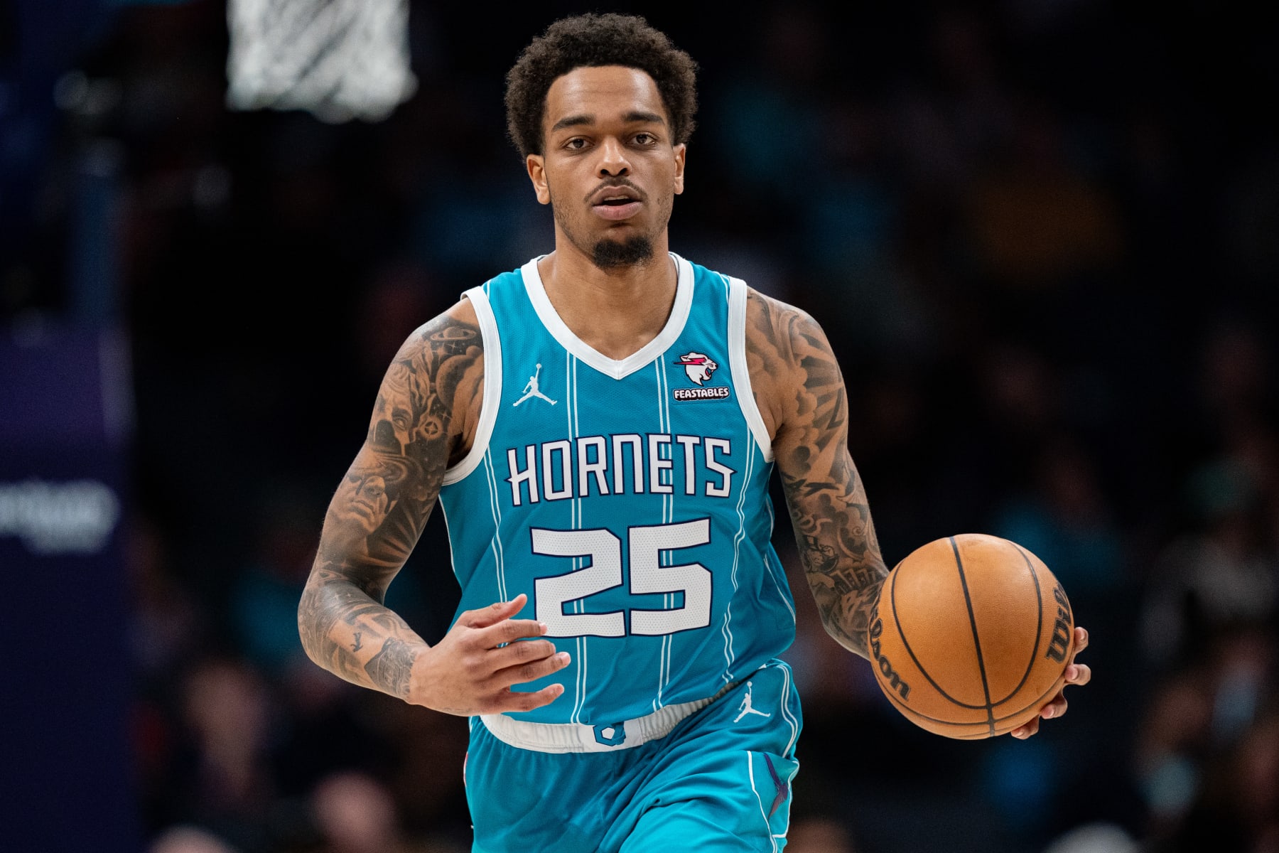 CHARLOTTE, NORTH CAROLINA - JANUARY 27: P.J. Washington #25 of the Charlotte Hornets brings the ball up court in the third quarter during their game against the Utah Jazz at Spectrum Center on January 27, 2024 in Charlotte, North Carolina. NOTE TO USER: User expressly acknowledges and agrees that, by downloading and or using this photograph, User is consenting to the terms and conditions of the Getty Images License Agreement. (Photo by Jacob Kupferman/Getty Images)