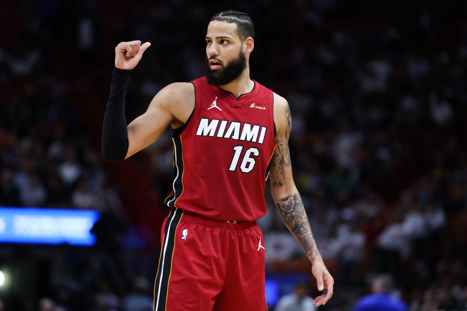 MIAMI, FLORIDA - FEBRUARY 07: Caleb Martin #16 of the Miami Heat reacts during the second quarter of the game against the San Antonio Spurs at Kaseya Center on February 07, 2024 in Miami, Florida. NOTE TO USER: User expressly acknowledges and agrees that, by downloading and or using this photograph, User is consenting to the terms and conditions of the Getty Images License Agreement. (Photo by Megan Briggs/Getty Images)