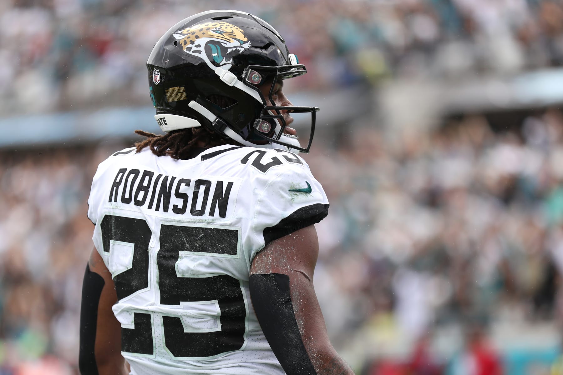JACKSONVILLE, FLORIDA - SEPTEMBER 18: James Robinson #25 of the Jacksonville Jaguars reacts after scoring a touchdown during the first half against the Indianapolis Colts at TIAA Bank Field on September 18, 2022 in Jacksonville, Florida. (Photo by Courtney Culbreath/Getty Images)