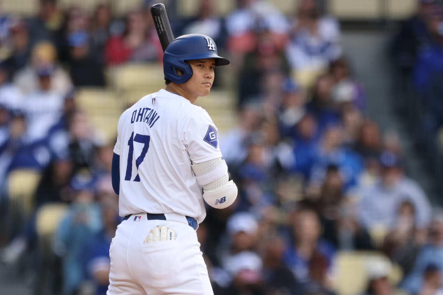 LOS ANGELES, CALIFORNIA - MARCH 31: Shohei Ohtani #17 of the Los Angeles Dodgers prepares to bat in the third inning against the St. Louis Cardinals at Dodger Stadium on March 31, 2024 in Los Angeles, California. (Photo by Katharine Lotze/Getty Images)