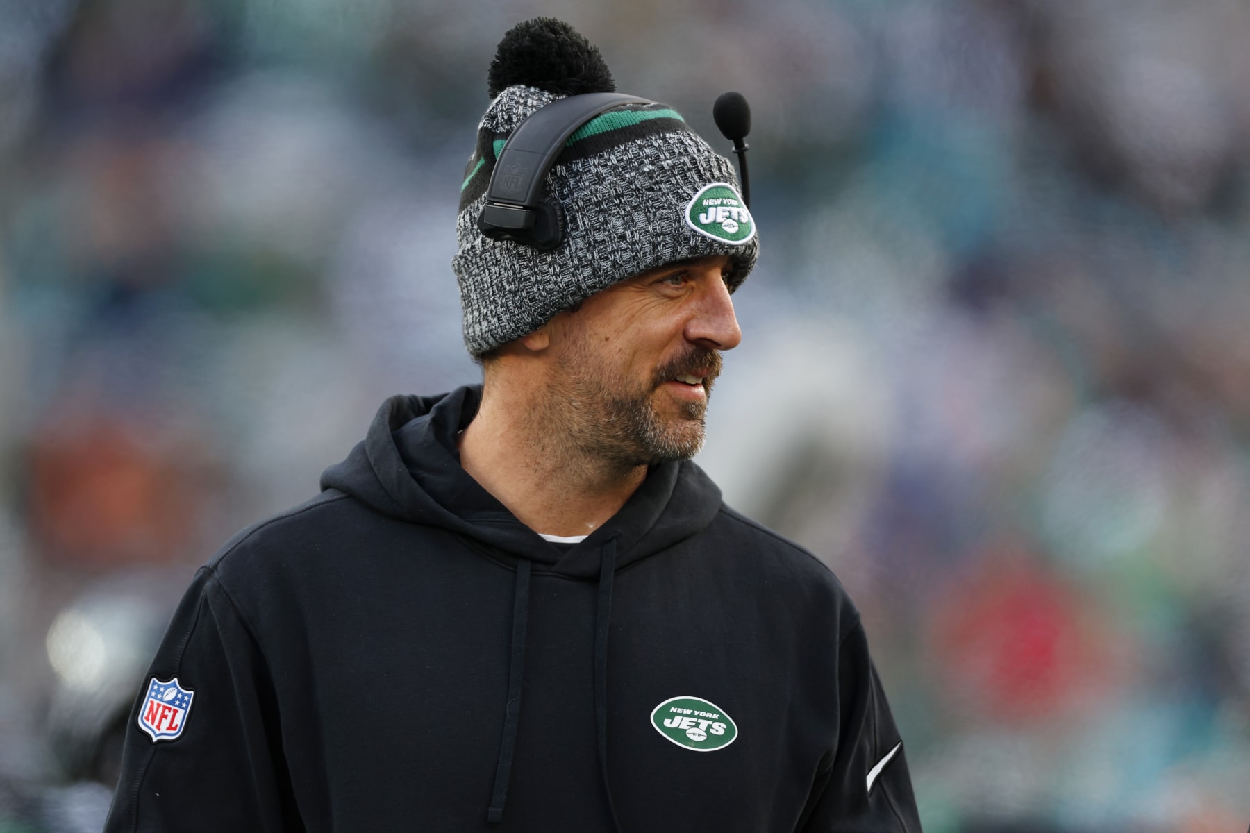EAST RUTHERFORD, NEW JERSEY - NOVEMBER 24: Quarterback Aaron Rodgers #8 of the New York Jets on the sidelines during a football game against the Miami Dolphins at MetLife Stadium on November 24, 2023 in East Rutherford, New Jersey. (Photo by Rich Schultz/Getty Images)