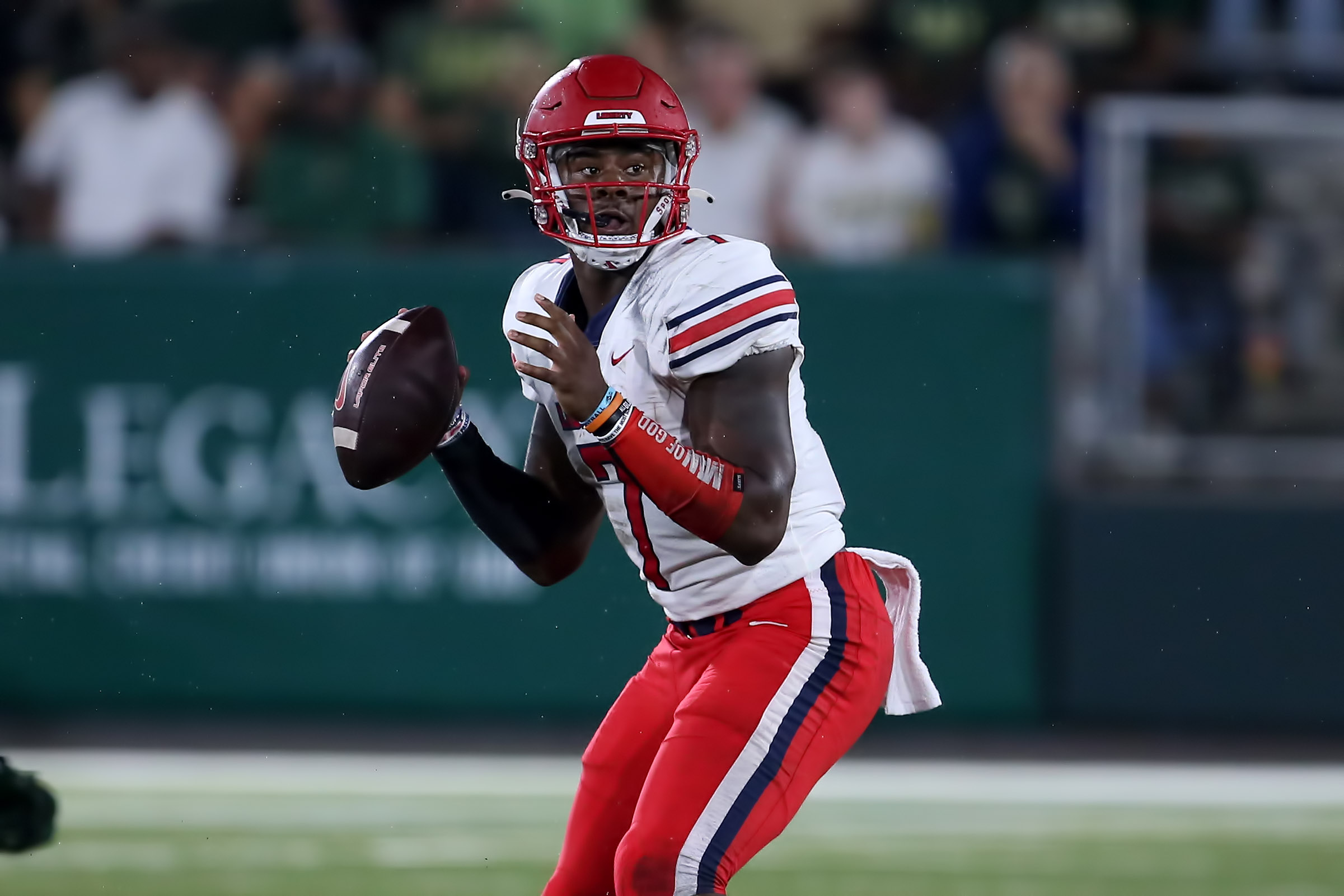 BIRMINGHAM, AL - OCTOBER 02:  Liberty Flames quarterback Malik Willis (7) during the game between the UAB Blazers and the Liberty Flames on October 2nd, 2021 and Protective Stadium in Birmingham, Alabama.  (Photo by Michael Wade/Icon Sportswire via Getty Images)