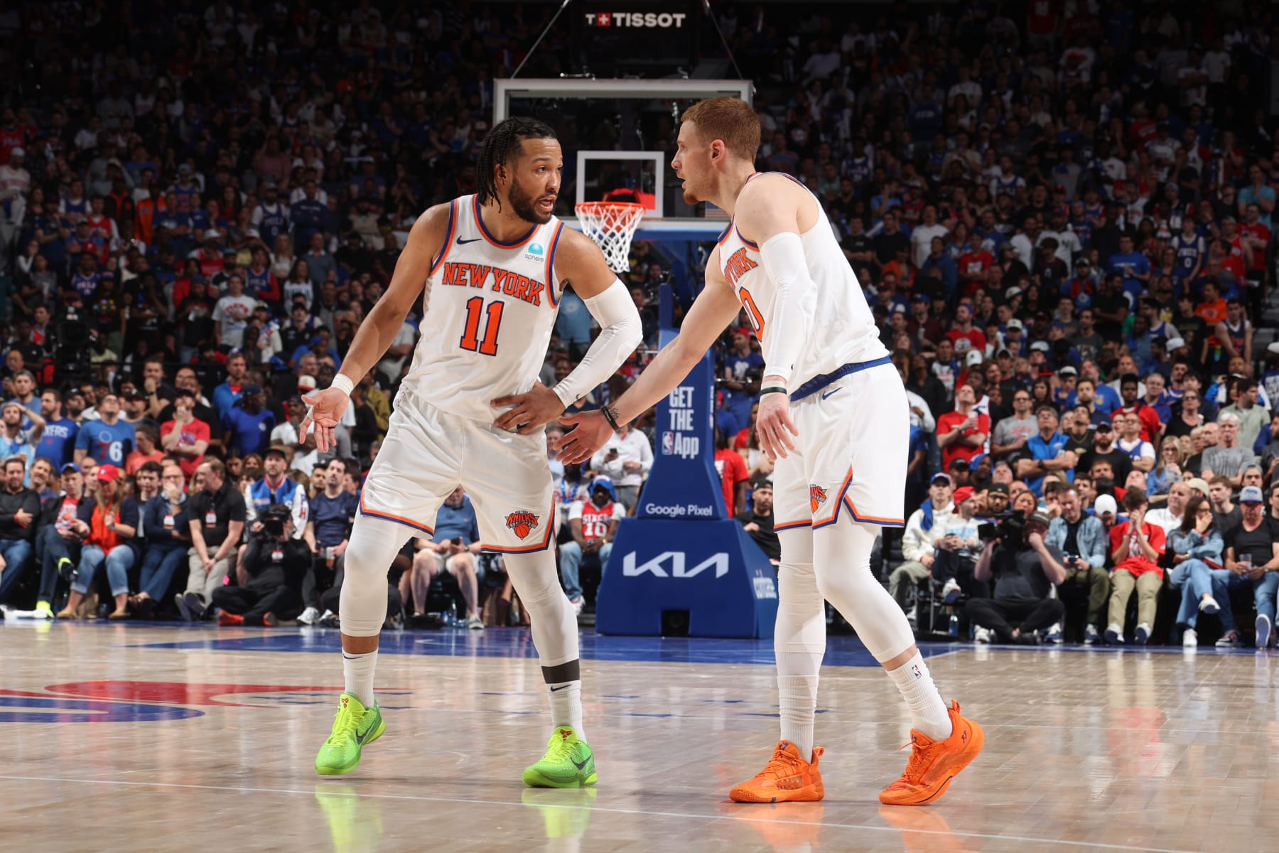 PHILADELPHIA, PA - MAY 2: Jalen Brunson #11 talks to Donte Divincenzo #0 of the New York Knicks during the game against the Philadelphia 76ers during Round 1 Game 6 on May 2, 2024 at the Wells Fargo Center in Philadelphia, Pennsylvania NOTE TO USER: User expressly acknowledges and agrees that, by downloading and/or using this Photograph, user is consenting to the terms and conditions of the Getty Images License Agreement. Mandatory Copyright Notice: Copyright 2023 NBAE (Photo by Nathaniel S. Butler/NBAE via Getty Images)