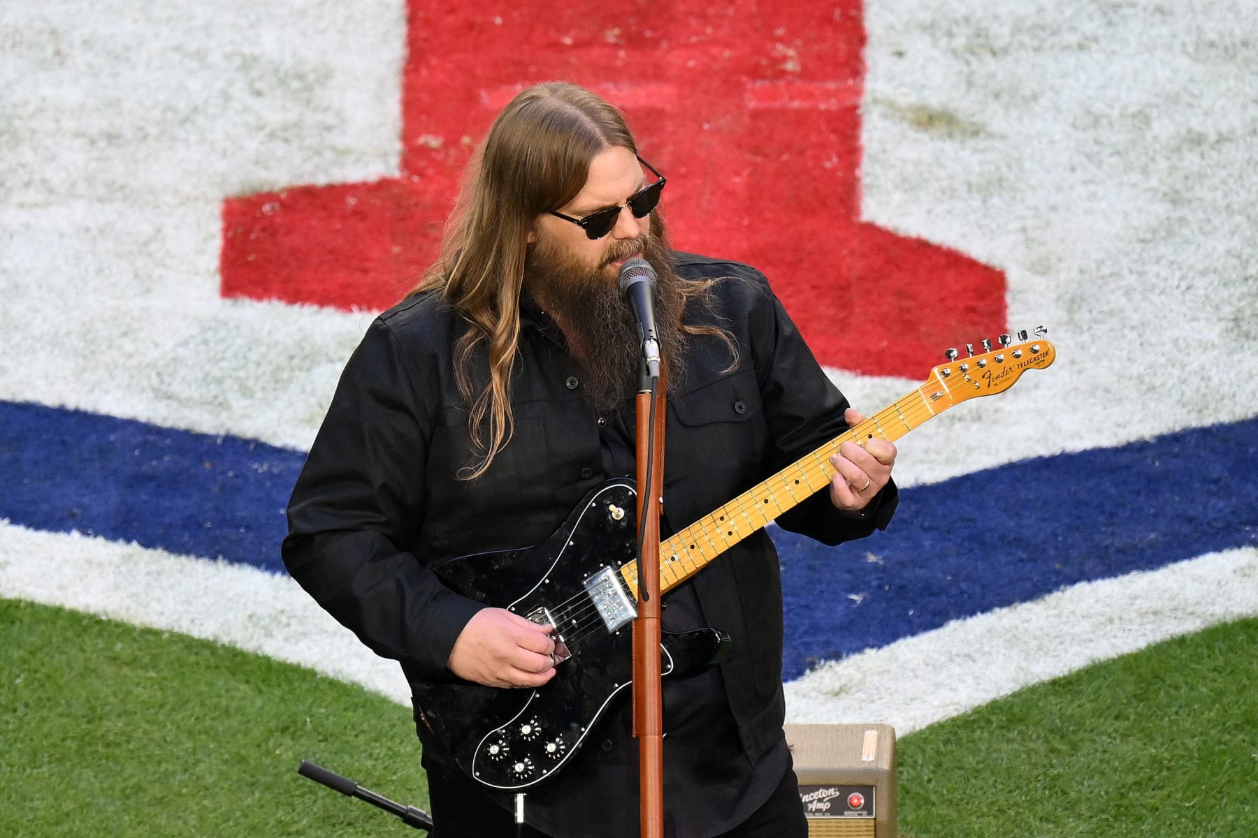 US singer-songwriter Chris Stapleton performs the US national anthem ahead of Super Bowl LVII between the Kansas City Chiefs and the Philadelphia Eagles at State Farm Stadium in Glendale, Arizona, on February 12, 2023. (Photo by ANGELA WEISS / AFP) (Photo by ANGELA WEISS/AFP via Getty Images)