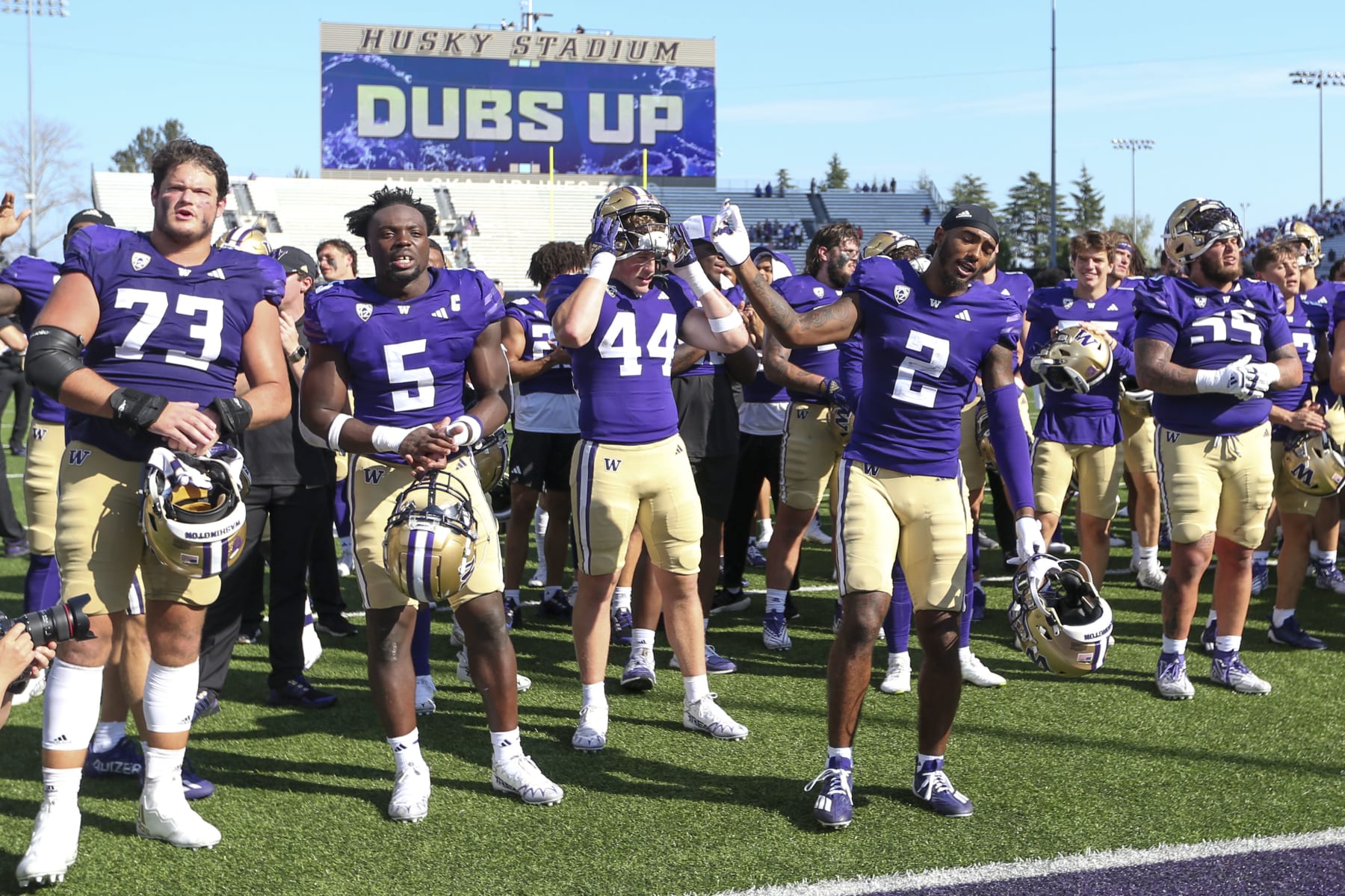 SEATTLE, WA - SEPTEMBER 02: Washington players sang the school fight song after the game to fans during a college football game between the Washington Huskies and Boise State Broncos on September 02, 2023, at Husky Stadium in Seattle, WA. (Photo by Jesse Beals/Icon Sportswire via Getty Images)