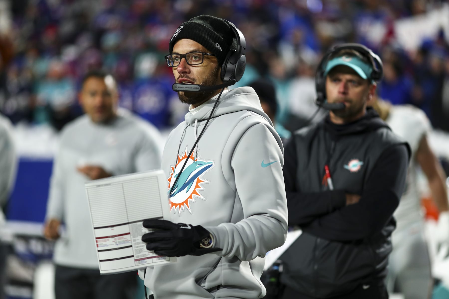 ORCHARD PARK, NY - DECEMBER 17: Head coach Mike McDaniel of the Miami Dolphins watches the coin toss from the sidelines prior to an NFL football game against the Buffalo Bills at Highmark Stadium on December 17, 2022 in Orchard Park, New York. (Photo by Kevin Sabitus/Getty Images)