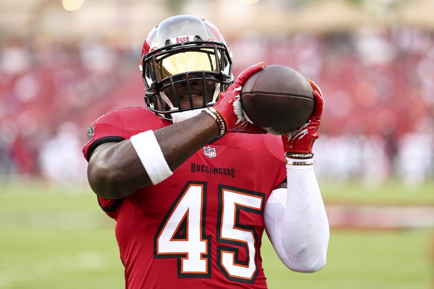 TAMPA, FL - AUGUST 26: Devin White #45 of the Tampa Bay Buccaneers warms up prior to an NFL preseason football game against the Baltimore Ravens at Raymond James Stadium on August 26, 2023 in Tampa, Florida. (Photo by Kevin Sabitus/Getty Images)