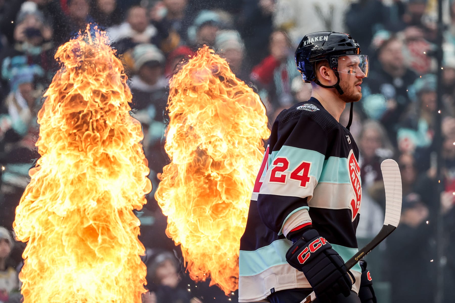 SEATTLE, WASHINGTON - JANUARY 01:  Jamie Oleksiak #24 of the Seattle Kraken walks toward the ice prior to the game against the Vegas Golden Knights at T-Mobile Park on January 01, 2024 in Seattle, Washington. (Photo by Steph Chambers/Getty Images)
