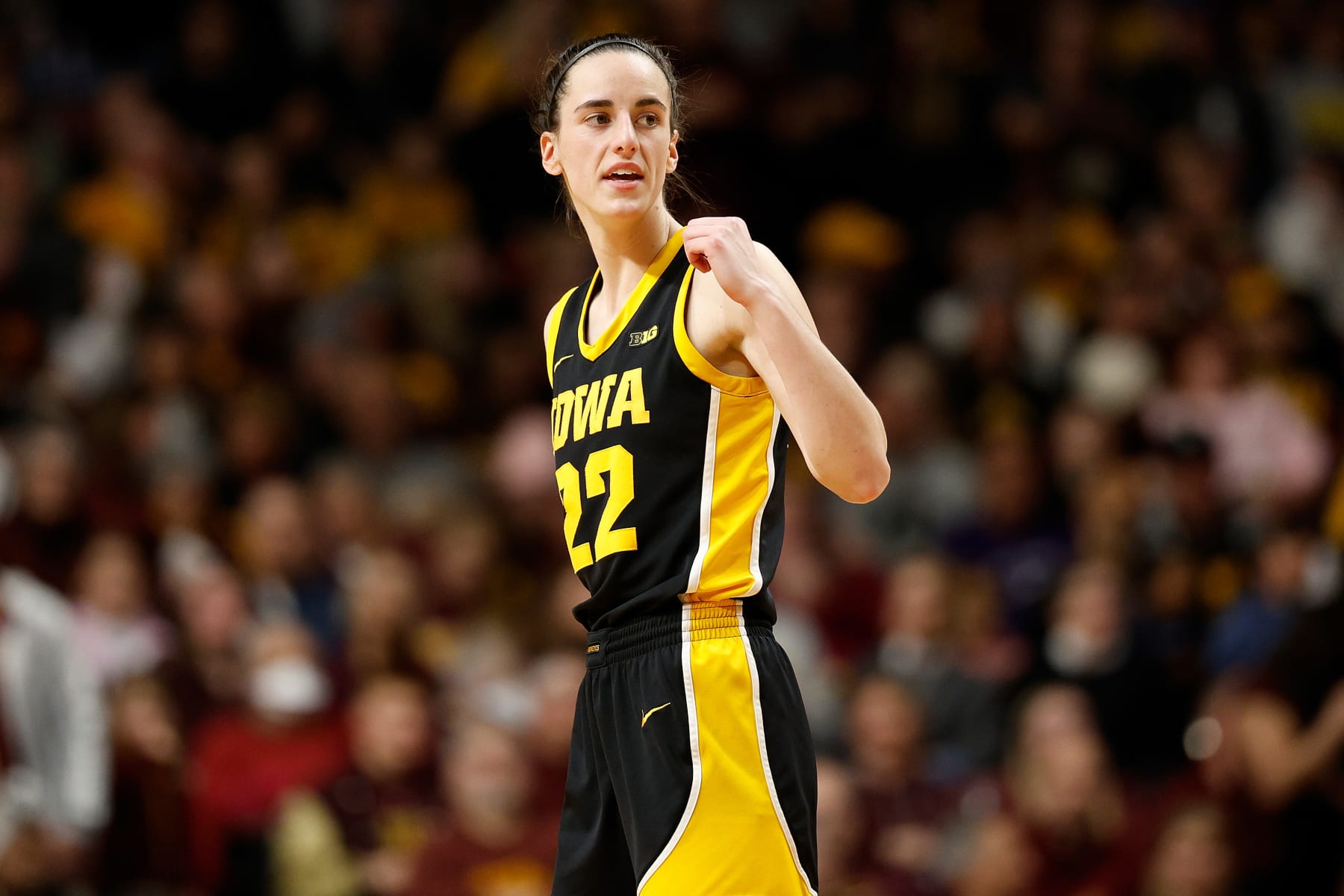MINNEAPOLIS, MINNESOTA - FEBRUARY 28: Caitlin Clark #22 of the Iowa Hawkeyes looks on against the Minnesota Golden Gophers in the second quarter at Williams Arena on February 28, 2024 in Minneapolis, Minnesota. The Hawkeyes defeated the Golden Gophers 108-60. (Photo by David Berding/Getty Images)