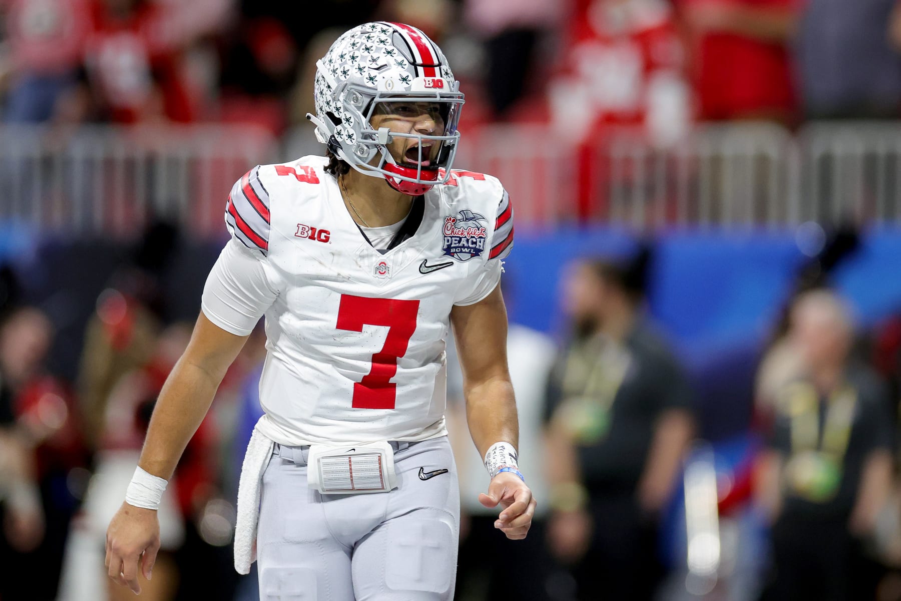 ATLANTA, GEORGIA - DECEMBER 31: C.J. Stroud #7 of the Ohio State Buckeyes reacts after a touchdown during the second quarter against the Georgia Bulldogs in the Chick-fil-A Peach Bowl at Mercedes-Benz Stadium on December 31, 2022 in Atlanta, Georgia. (Photo by Carmen Mandato/Getty Images)