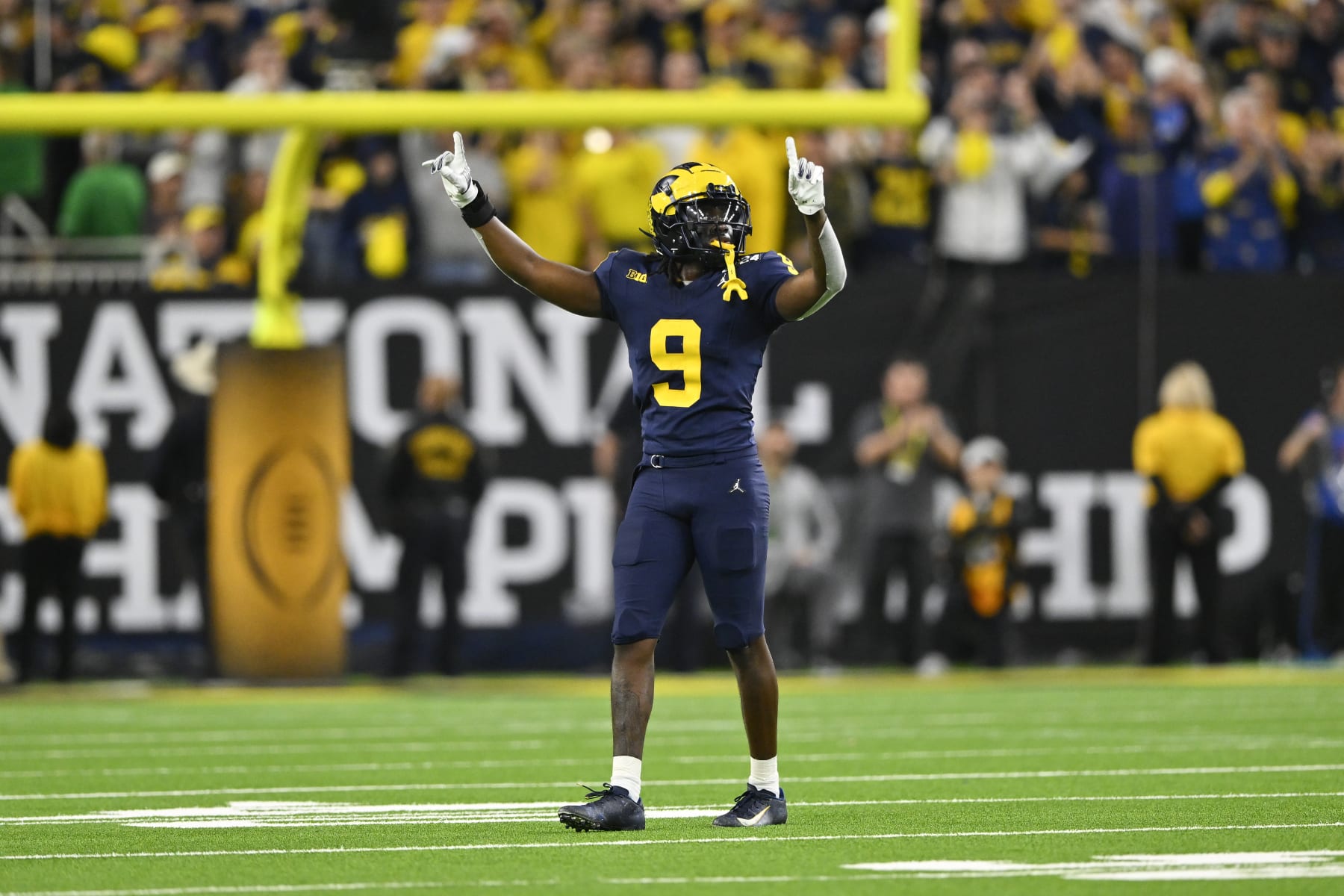 Rod Moore #9 of the Michigan Wolverines