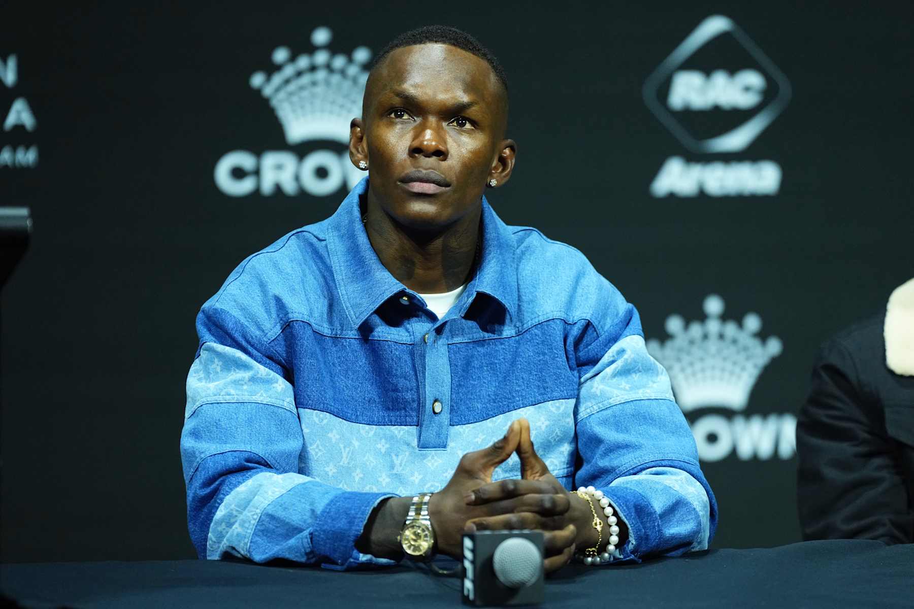 PERTH, AUSTRALIA - AUGUST 16: Israel Adesanya of Nigeria is seen on stage during the UFC 305 press conference at RAC Arena on August 16, 2024 in Perth, Australia. (Photo by Jeff Bottari/Zuffa LLC)