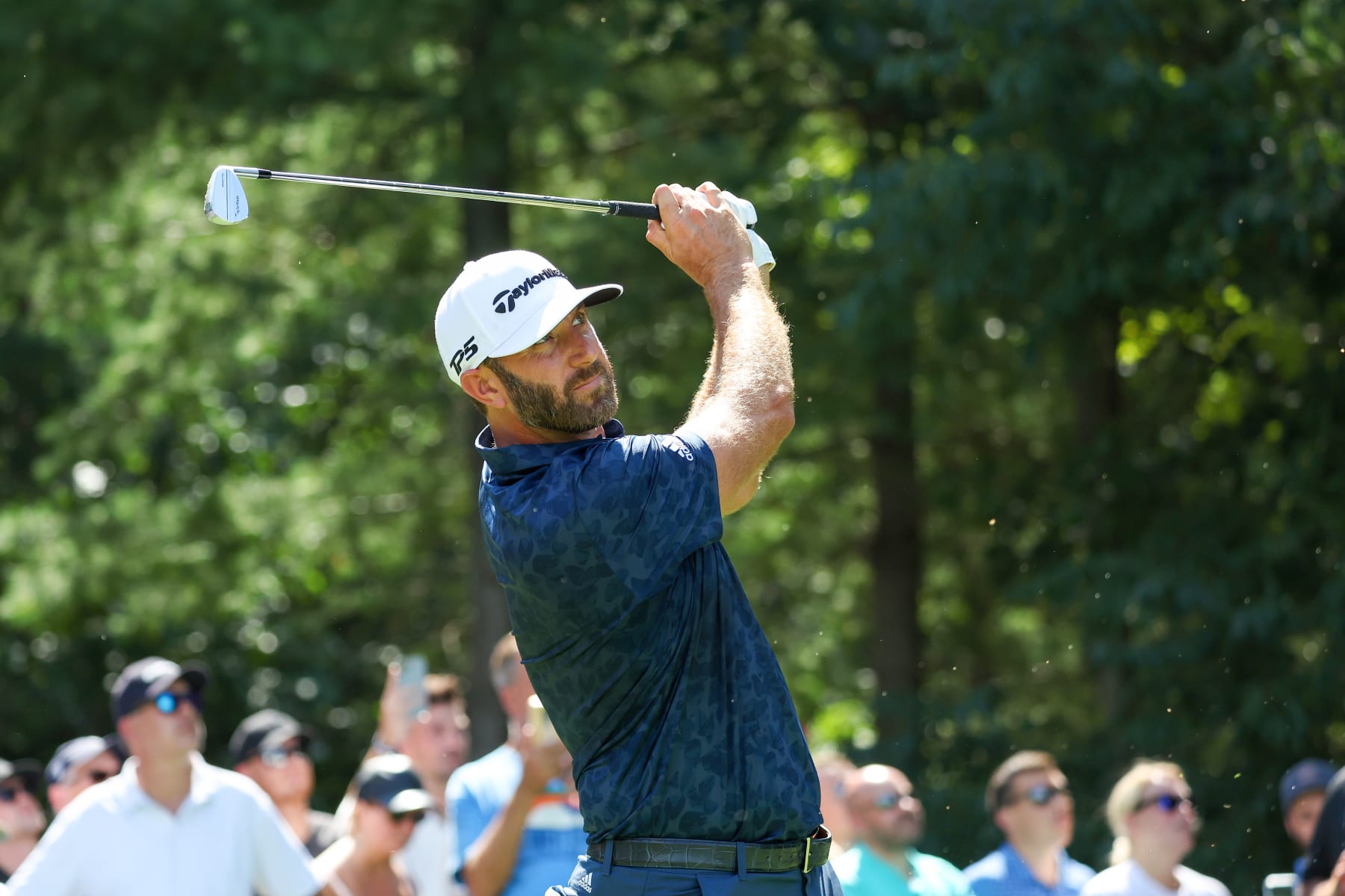 BOLTON, MASSACHUSETTS - SEPTEMBER 04: Team Captain Dustin Johnson of 4 Aces GC plays his shot from the second tee during Day Three of the LIV Golf Invitational - Boston at The Oaks golf course at The International on September 04, 2022 in Bolton, Massachusetts. (Photo by Jonathan Ferrey/LIV Golf via Getty Images) BOLTON, MASSACHUSETTS - SEPTEMBER 04: Team Captain Dustin Johnson of 4 Aces GC plays his shot from the second tee during Day Three of the LIV Golf Invitational - Boston at The Oaks golf course at The International on September 04, 2022 in Bolton, Massachusetts. (Photo by Jonathan Ferrey/LIV Golf via Getty Images)