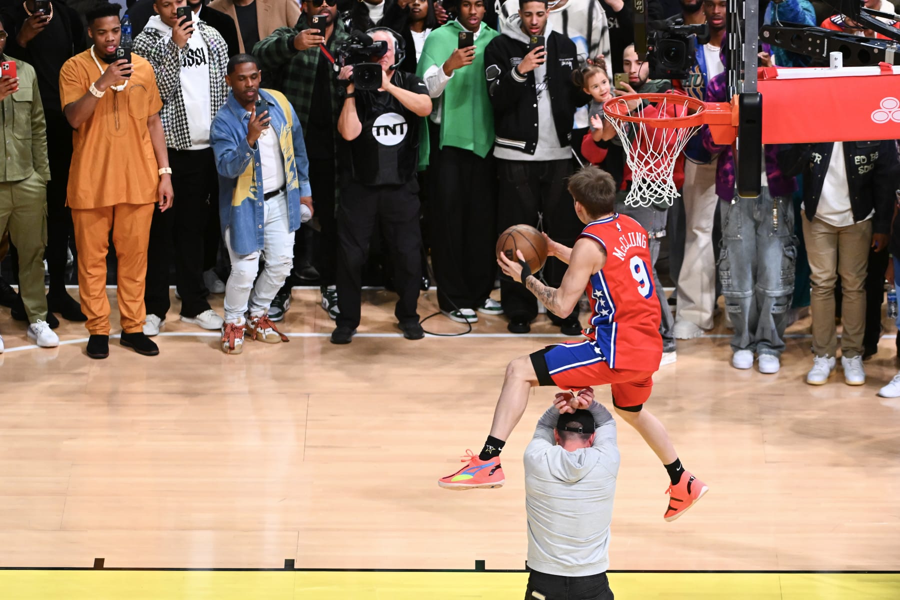 SALT LAKE CITY, UTAH - FEBRUARY 18: Mac McClung #9 of the Philadelphia 76ers dunks the ball during the final round of the 2023 NBA All Star AT&T Slam Dunk Contest at Vivint Arena on February 18, 2023 in Salt Lake City, Utah. NOTE TO USER: User expressly acknowledges and agrees that, by downloading and or using this photograph, User is consenting to the terms and conditions of the Getty Images License Agreement. (Photo by Alex Goodlett/Getty Images)