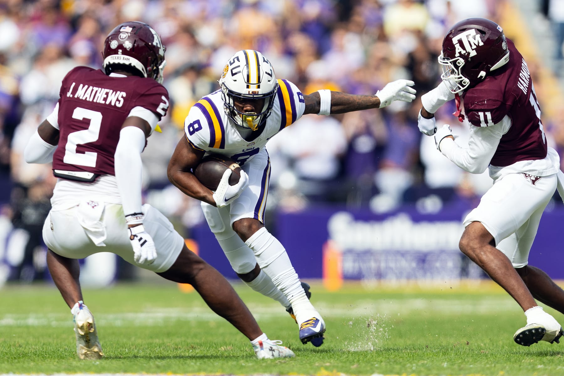 BATON ROUGE, LA - NOVEMBER 25: LSU Tigers wide receiver Malik Nabers (8) catches a pass during a game between the Texas A&M Aggies and the LSU Tigers in Tiger Stadium in Baton Rouge, Louisiana on November 25, 2023.(Photo by John Korduner/Icon Sportswire via Getty Images)