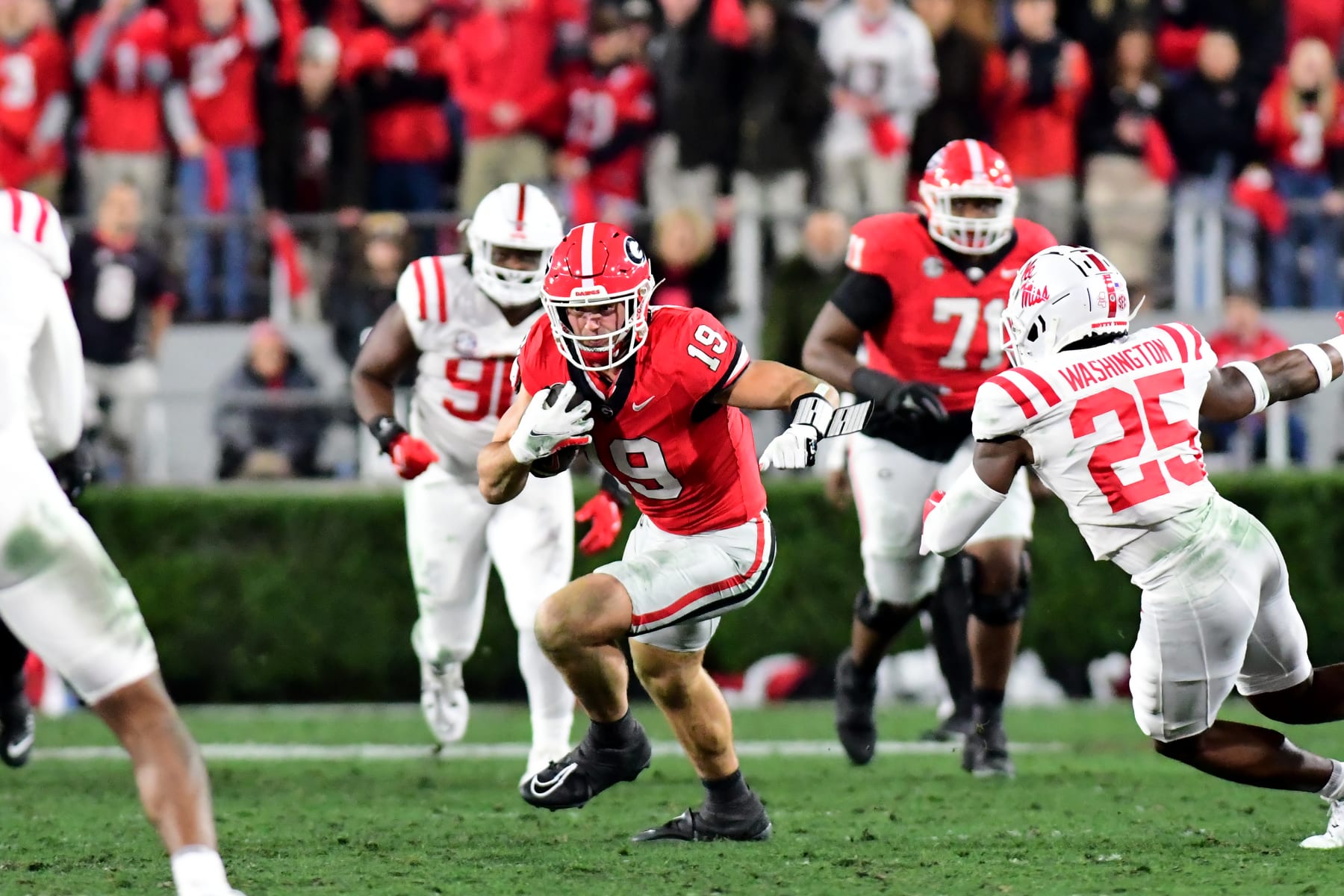 ATHENS, GA - NOVEMBER 11: Brock Bowers #19 runs after catching a pass during a game between University of Mississippi and University of Georgia at Sanford Stadium on November 11, 2023 in Athens, Georgia. (Photo by Perry McIntyre/ISI Photos/Getty Images)