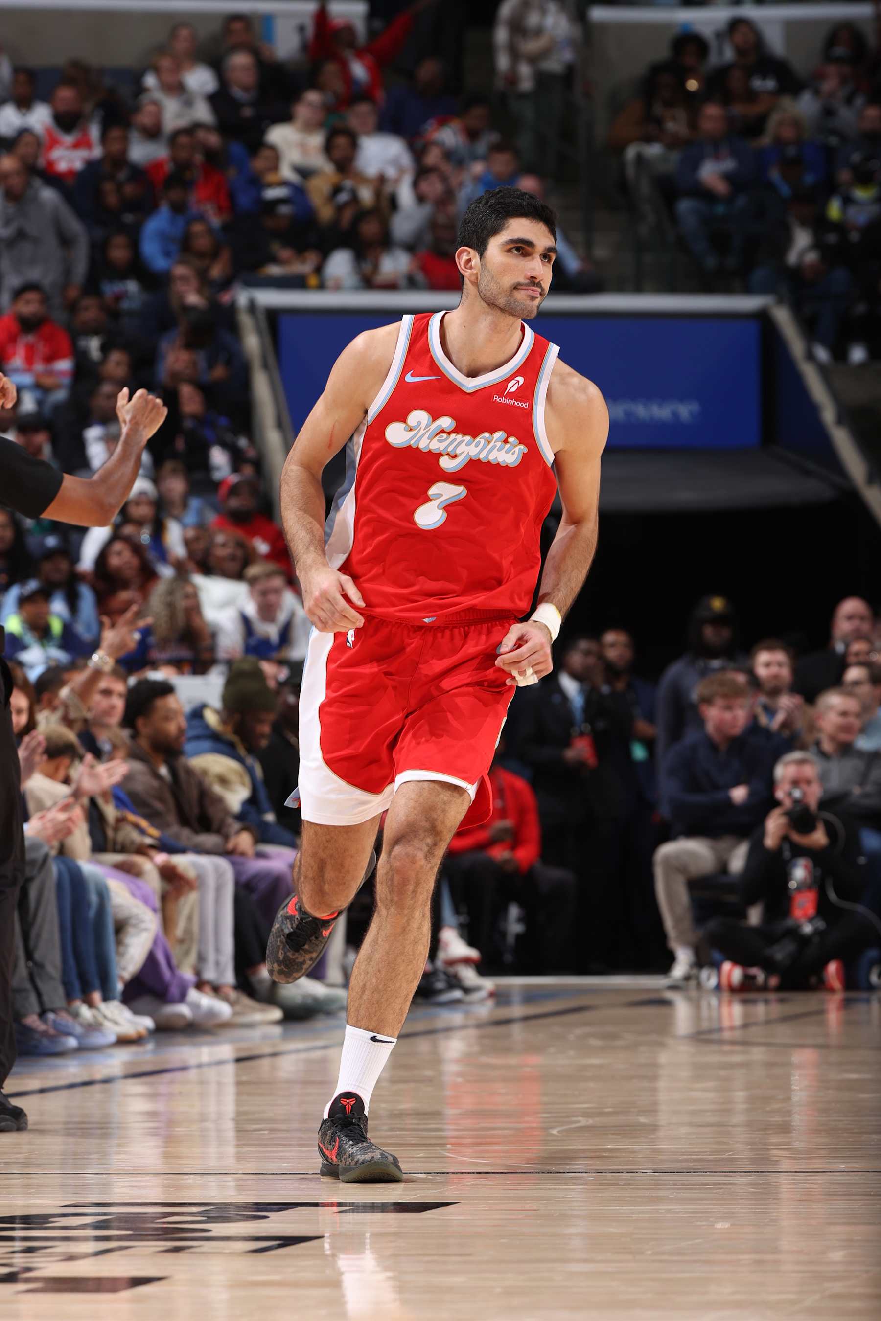 MEMPHIS, TN - DECEMBER 19: Santi Aldama #7 of the Memphis Grizzlies looks on during the game against the Golden State Warriors on December 19, 2024 at FedExForum in Memphis, Tennessee. NOTE TO USER: User expressly acknowledges and agrees that, by downloading and or using this photograph, User is consenting to the terms and conditions of the Getty Images License Agreement. Mandatory Copyright Notice: Copyright 2024 NBAE (Photo by Joe Murphy/NBAE via Getty Images)