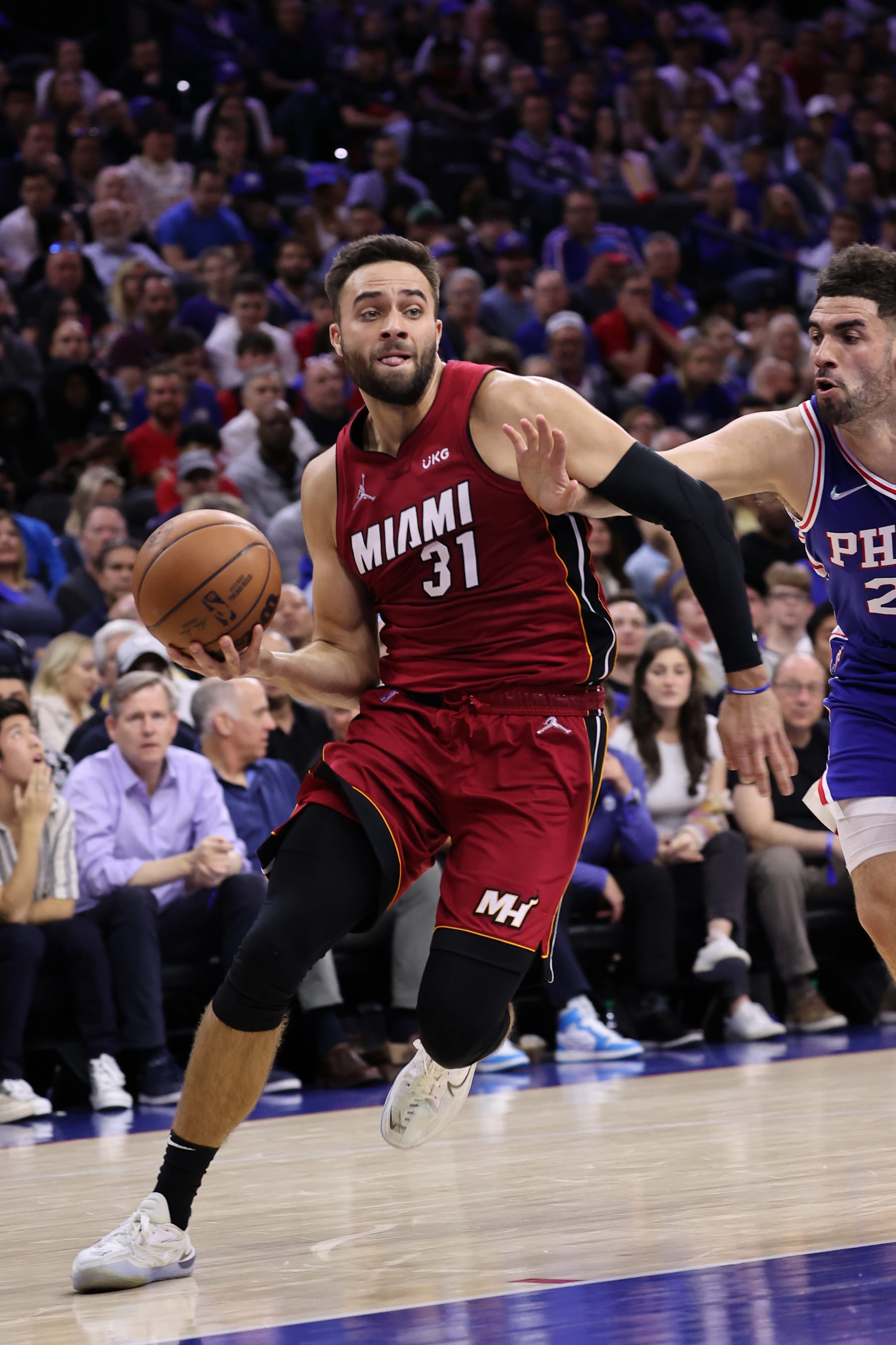 PHILADELPHIA, PA, USA - MAY 12: Georges Niang (R) of Philadelphia 76ers and Max Strus of Miami Heat in action during NBA semifinals between Philadelphia 76ers and Miami Heat at the Wells Fargo Center in Philadelphia, Pennsylvania, United States on May 12, 2022. (Photo by Tayfun Coskun/Anadolu Agency via Getty Images)