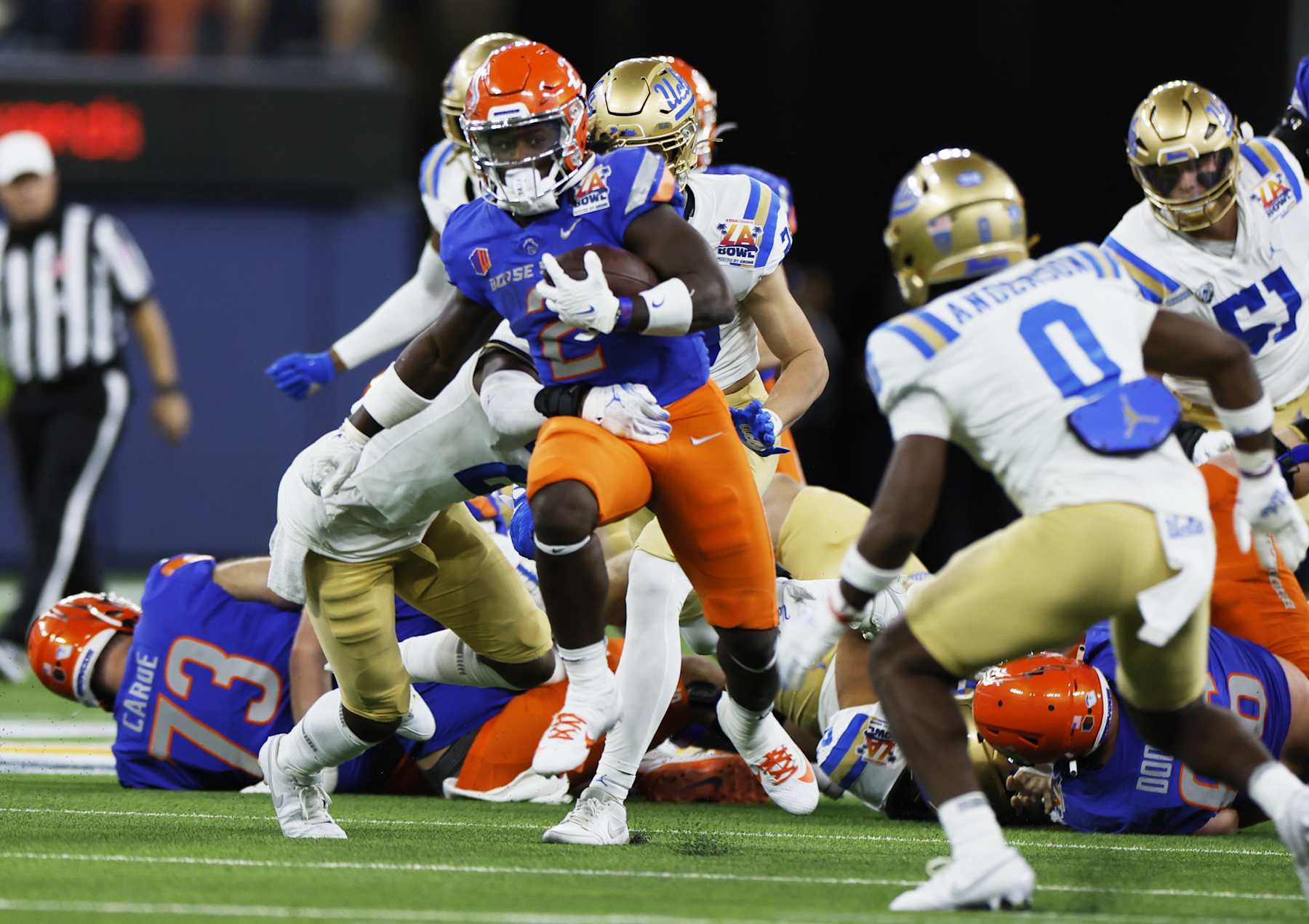 Los Angeles, CA - December 16: Boise State RB Ashton Jeanty breaks into the secondary for. first down against UCLA at The Starco Brands LA Bowl UCLA vs. Boise State at SoFi Stadium on Saturday, Dec. 16, 2023 in Los Angeles, CA. (Robert Gauthier / Los Angeles Times via Getty Images)