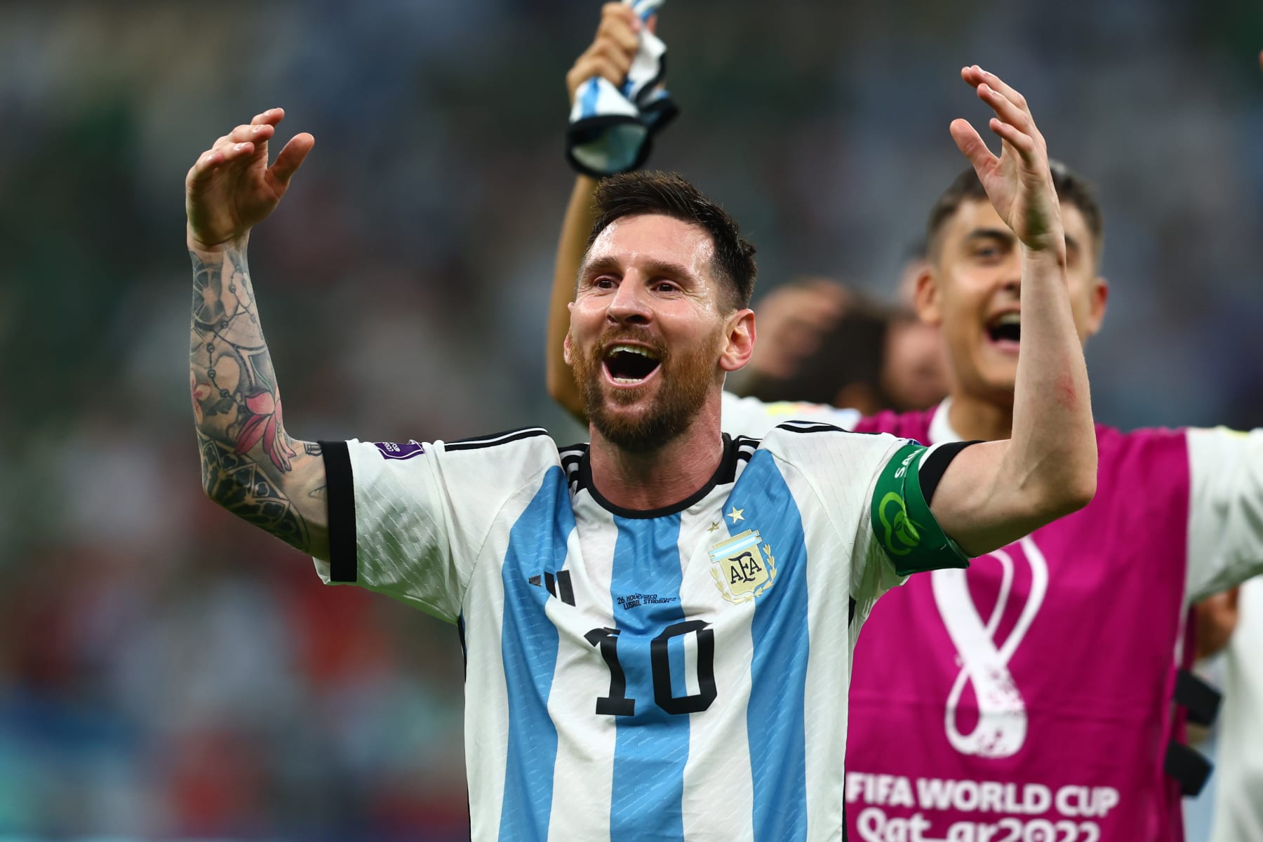 LUSAIL CITY, QATAR - NOVEMBER 26:   Lionel Messi of Argentina celebrates at the end of the FIFA World Cup Qatar 2022 Group C match between Argentina and Mexico at Lusail Stadium on November 26, 2022 in Lusail City, Qatar. (Photo by Chris Brunskill/Fantasista/Getty Images)