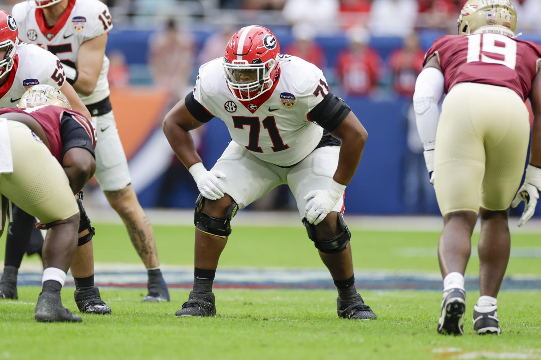 MIAMI GARDENS, FL - DECEMBER 30: Georgia Bulldogs offensive lineman Earnest Greene III (71) lines up for a play during the game between the Georgia Bulldogs and the Florida State Seminoles on December 30, 2023 at Hard Rock Stadium in Miami Gardens, Fl.  (Photo by David Rosenblum/Icon Sportswire via Getty Images)