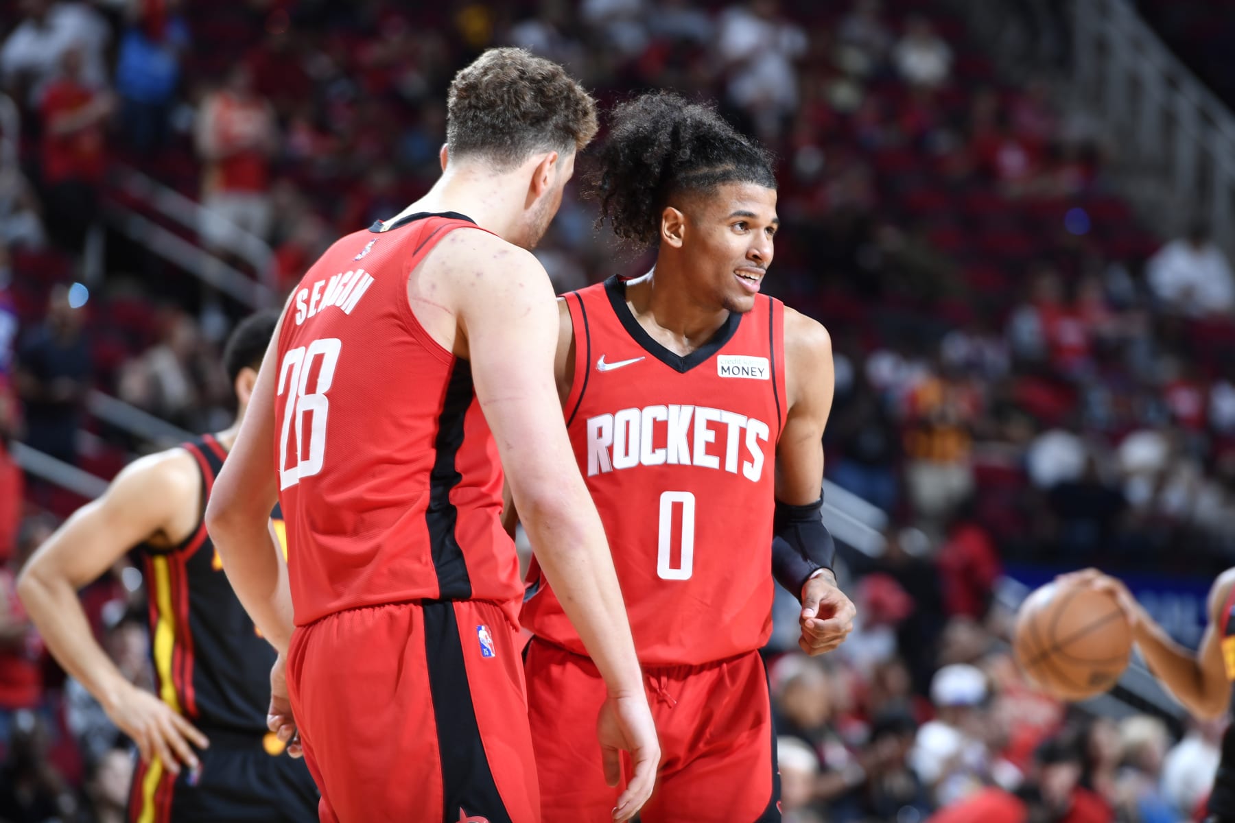 HOUSTON, TX - APRIL 10: Alperen Sengun #28 celebrates with Jalen Green #0 of the Houston Rockets during the game against the Atlanta Hawks on April 10, 2022 at the Toyota Center in Houston, Texas. NOTE TO USER: User expressly acknowledges and agrees that, by downloading and or using this photograph, User is consenting to the terms and conditions of the Getty Images License Agreement. Mandatory Copyright Notice: Copyright 2022 NBAE (Photo by Logan Riely/NBAE via Getty Images)