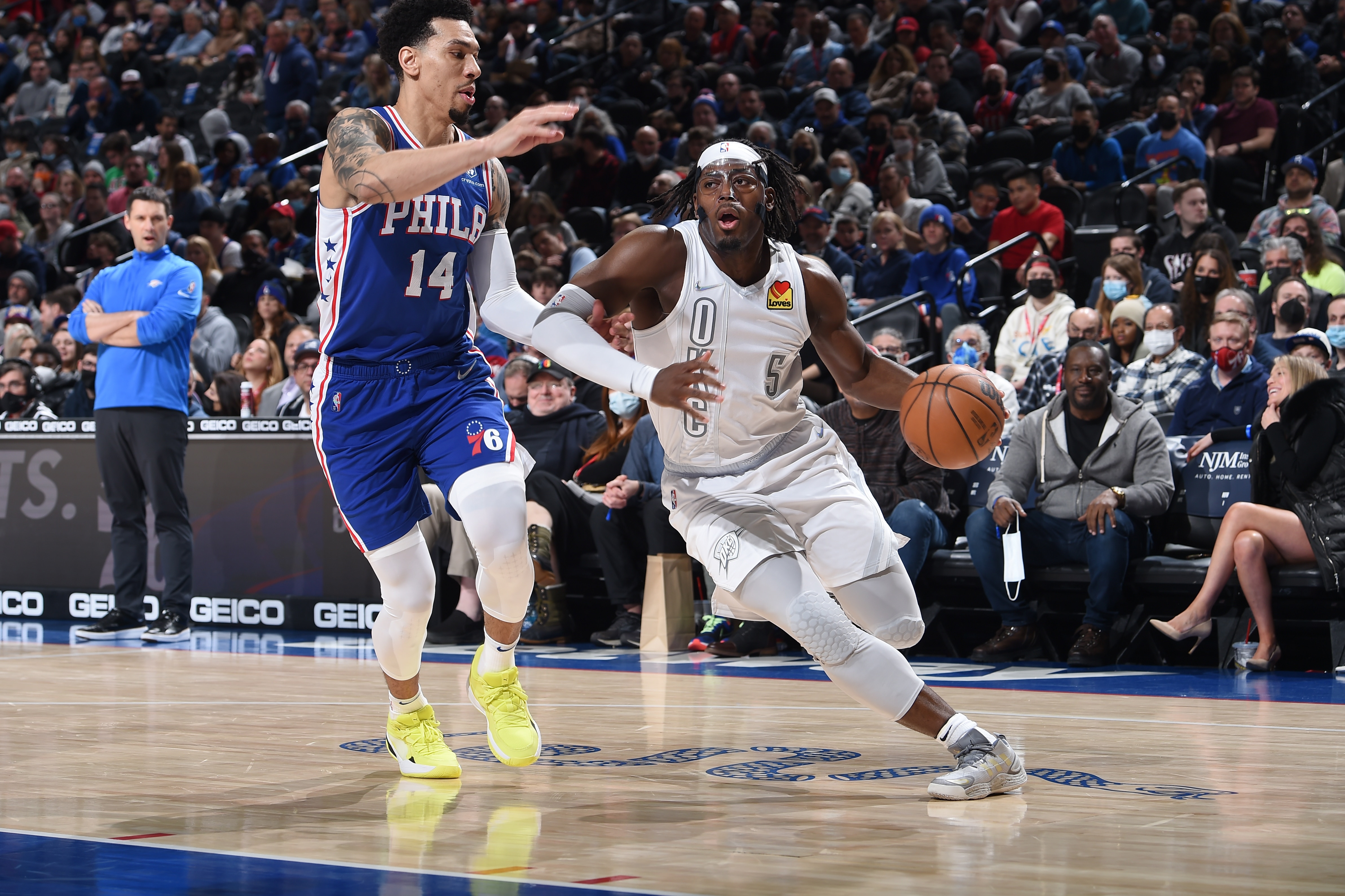 PHILADELPHIA, PA - FEBRUARY 11: Luguentz Dort #5 of the Oklahoma City Thunder drives to the basket during the game against the Philadelphia 76ers on February 11, 2022 at the Wells Fargo Center in Philadelphia, Pennsylvania NOTE TO USER: User expressly acknowledges and agrees that, by downloading and/or using this Photograph, user is consenting to the terms and conditions of the Getty Images License Agreement. Mandatory Copyright Notice: Copyright 2022 NBAE (Photo by David Dow/NBAE via Getty Images)