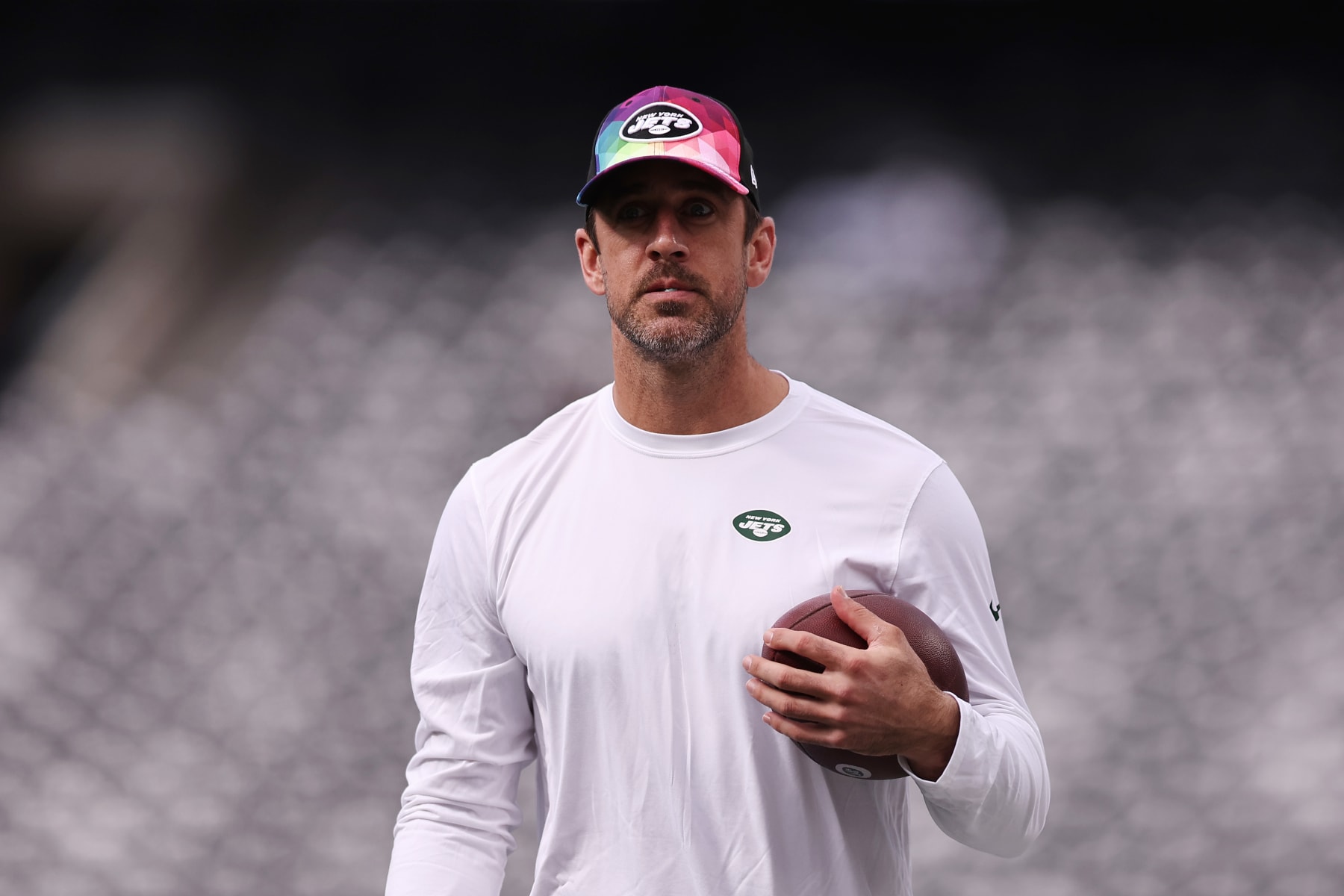 EAST RUTHERFORD, NEW JERSEY - OCTOBER 15: Aaron Rodgers #8 of the New York Jets looks on prior to the game against the Philadelphia Eagles at MetLife Stadium on October 15, 2023 in East Rutherford, New Jersey. (Photo by Dustin Satloff/Getty Images)