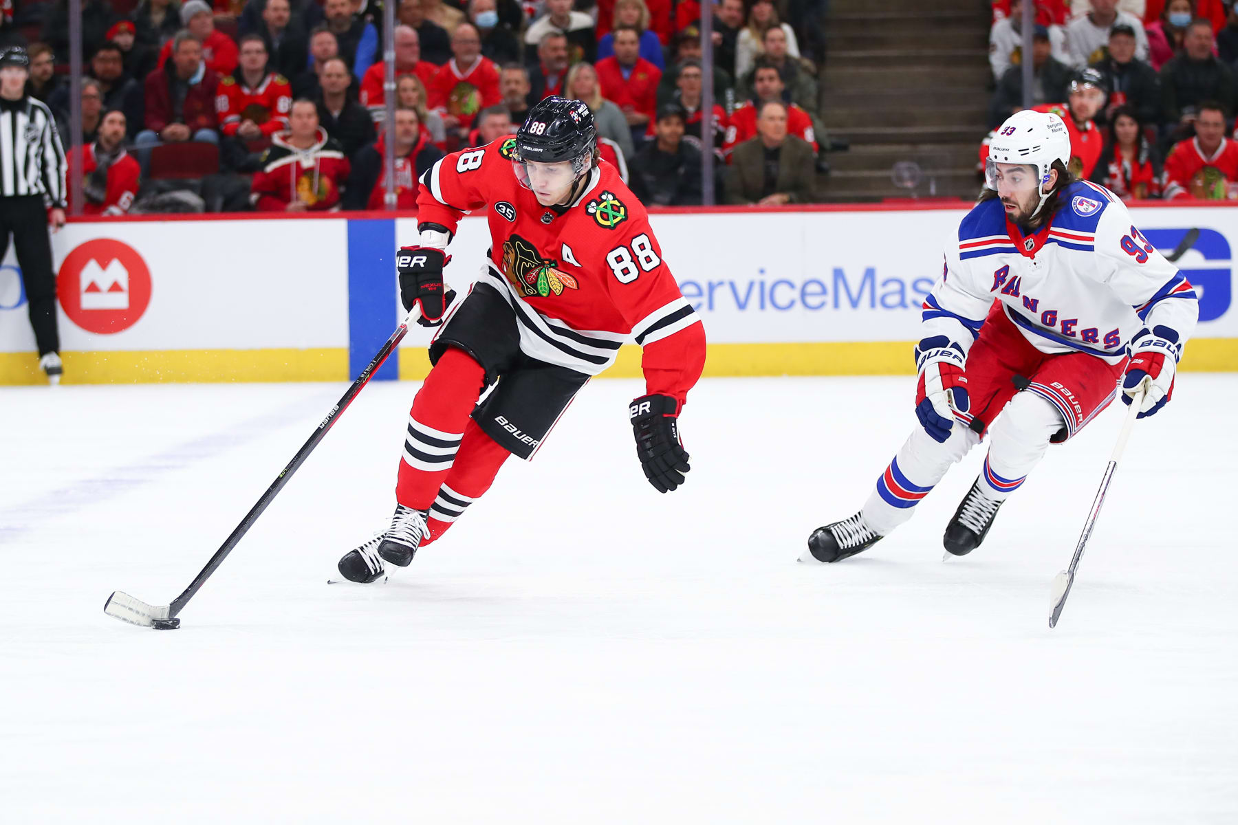 CHICAGO, IL - DECEMBER 07: Chicago Blackhawks Right Wing Patrick Kane (88) skates with the puck in action during a game between the Chicago Blackhawks and the New York Rangers on December 7, 2021 at the United Center in Chicago, IL. (Photo by Melissa Tamez/Icon Sportswire via Getty Images)