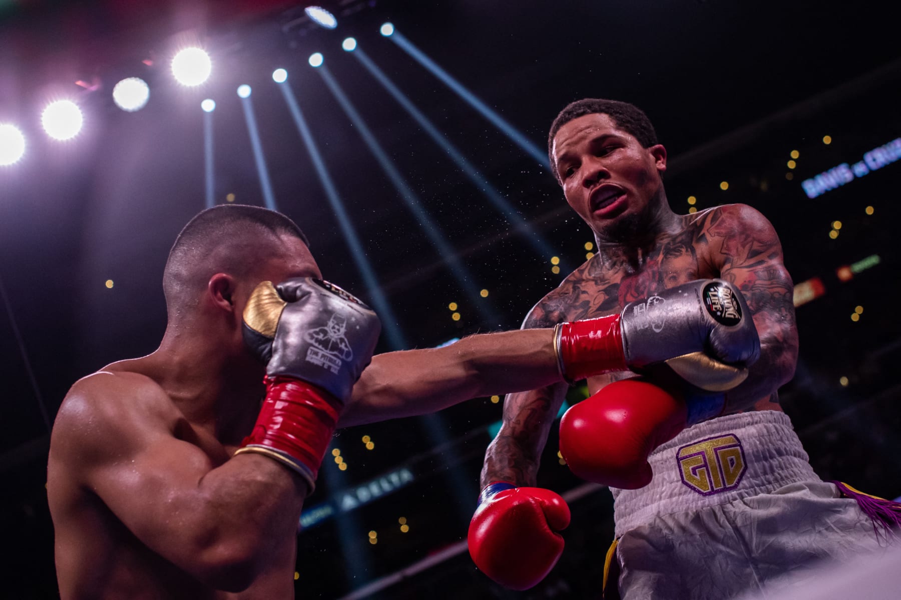 US boxer Gervonta Davis (R) fights Mexican boxer Isaac Cruz during their WBA Lightweight Championship bout at the Staples center in Los Angeles, California on December 5, 2021. (Photo by Apu GOMES / AFP) (Photo by APU GOMES/AFP via Getty Images)