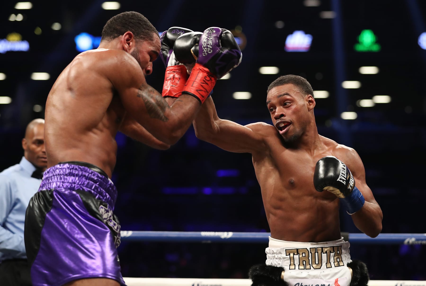 NEW YORK, NY - JANUARY 20:  Errol Spence punches Lamont Peterson during their IBF Welterweight title fight at the Barclays Center on January 20, 2018 in New York City.  (Photo by Al Bello/Getty Images)