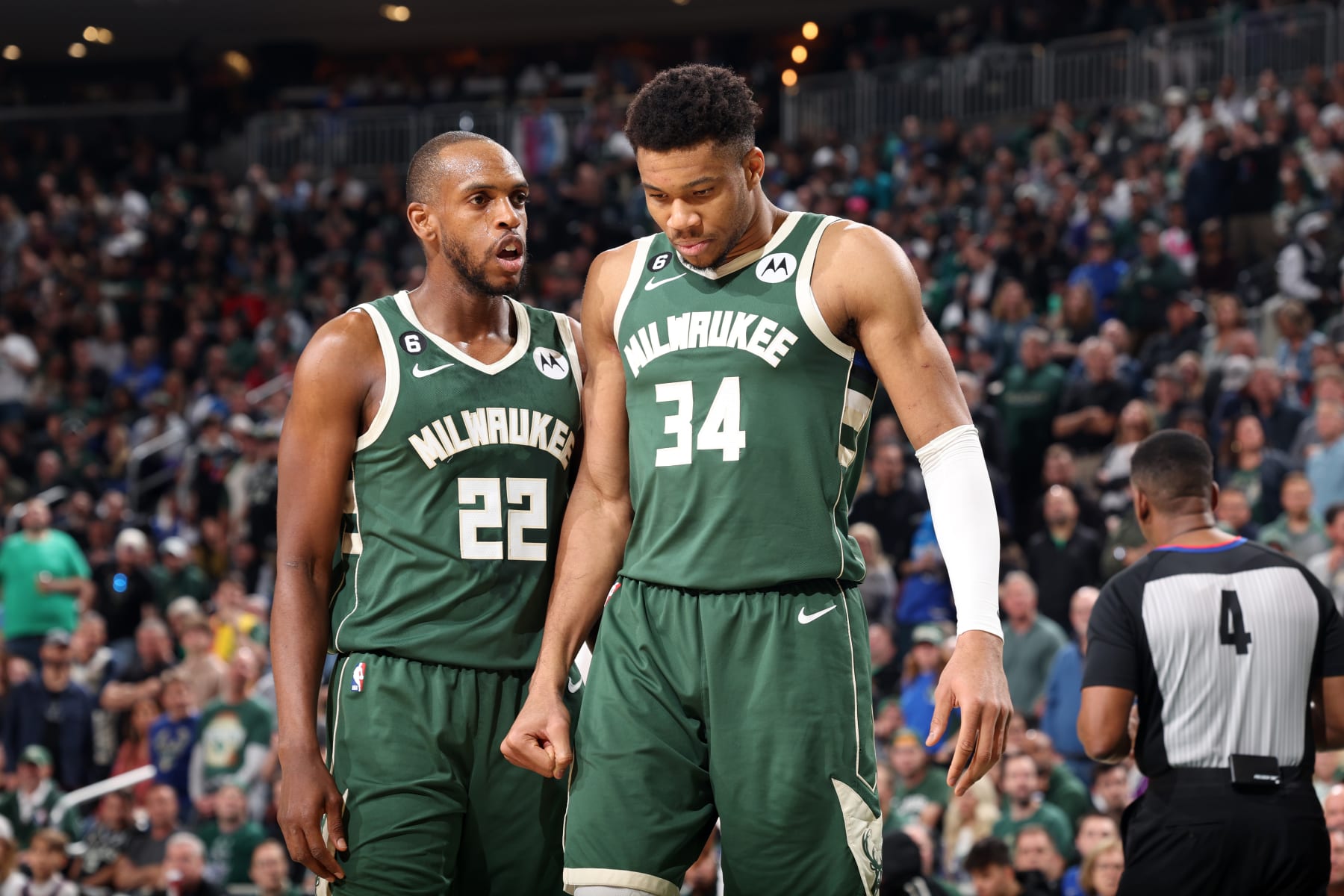 MILWAUKEE, WI - APRIL 26: Khris Middleton #22 of the Milwaukee Bucks talks to Giannis Antetokounmpo #34 during the game against the Miami Heat during Round 1 Game 5 of the 2023 NBA Playoffs on April 26, 2023 at the Fiserv Forum Center in Milwaukee, Wisconsin. NOTE TO USER: User expressly acknowledges and agrees that, by downloading and or using this Photograph, user is consenting to the terms and conditions of the Getty Images License Agreement. Mandatory Copyright Notice: Copyright 2023 NBAE (Photo by Jeff Haynes/NBAE via Getty Images).