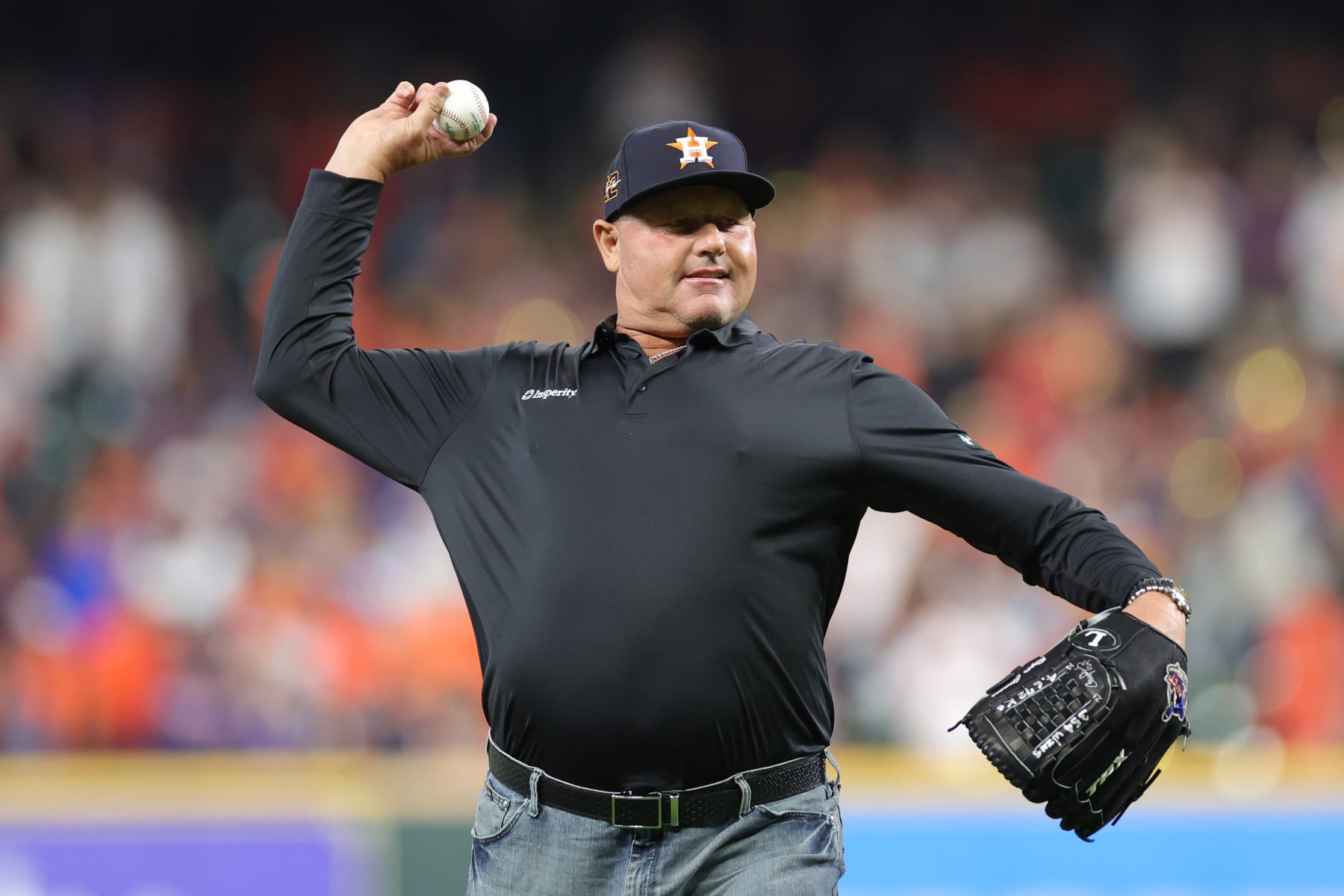 HOUSTON, TEXAS - OCTOBER 19: Former Houston Astros pitcher Roger Clemens throws out the first pitch before the game against the  New York Yankees in game one of the American League Championship Series at Minute Maid Park on October 19, 2022 in Houston, Texas. (Photo by Carmen Mandato/Getty Images)