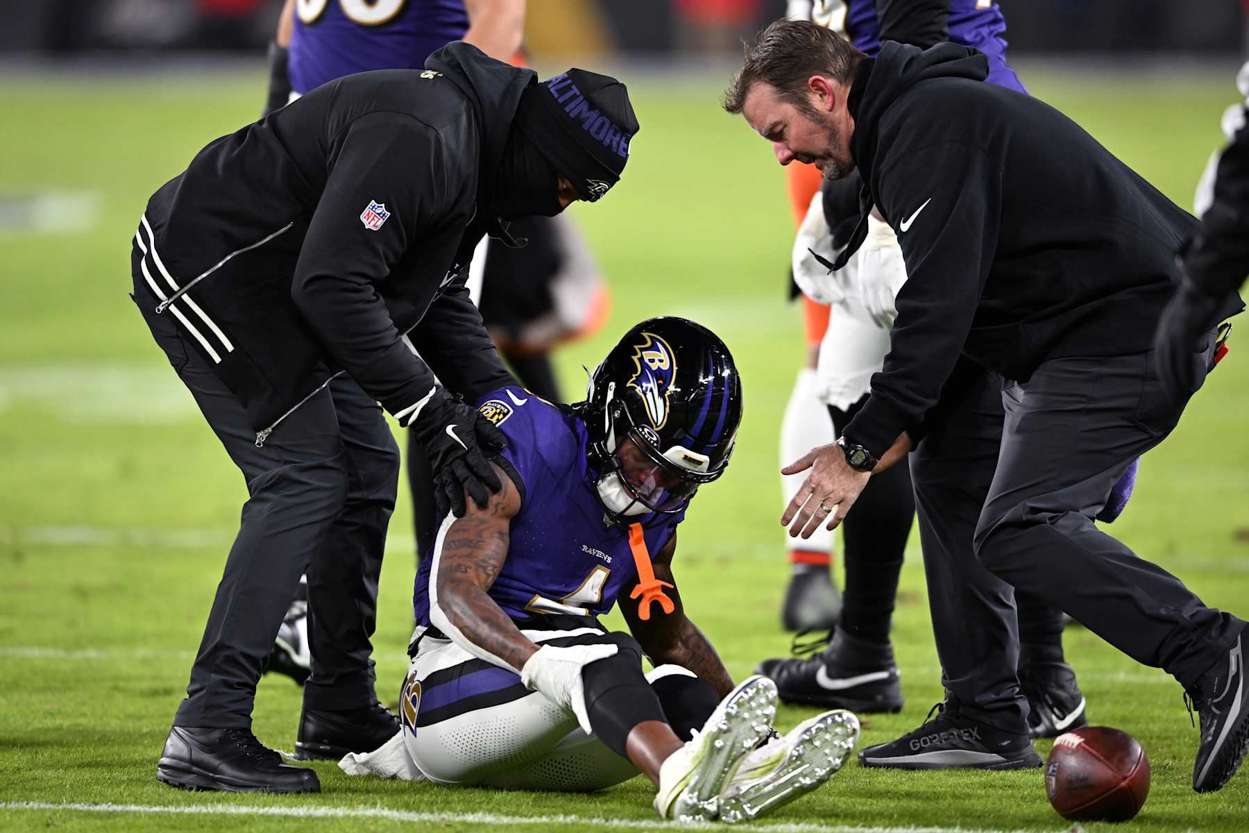 BALTIMORE, MARYLAND - JANUARY 04: Zay Flowers #4 of the Baltimore Ravens lays on the field after an apparent injury during the second quarter against the Cleveland Browns at M&T Bank Stadium on January 04, 2025 in Baltimore, Maryland. (Photo by Greg Fiume/Getty Images)